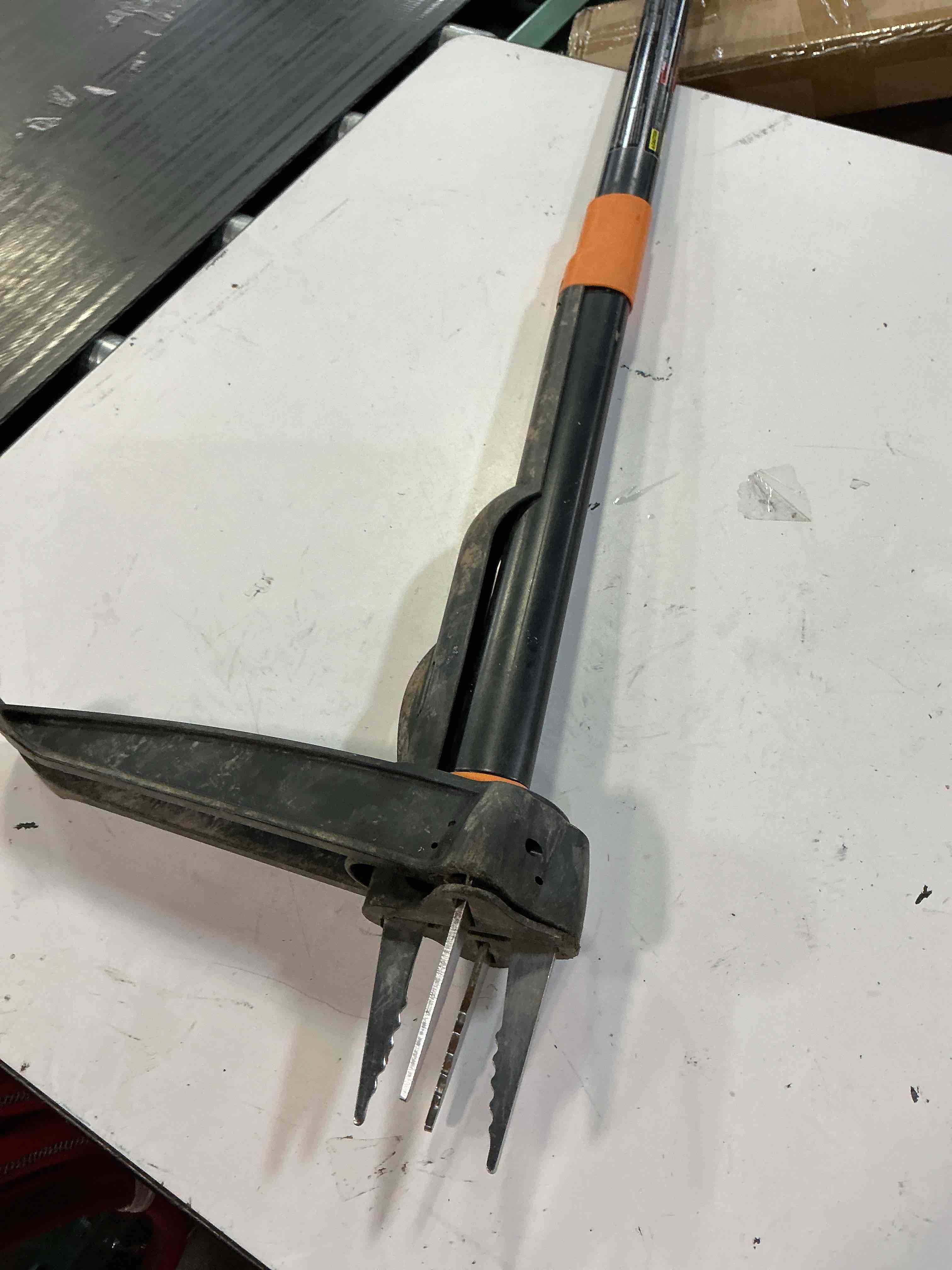 Condition photo showing As Is for fiskars 39.25 in. stainless steel weeder aluminum handle  black and orange