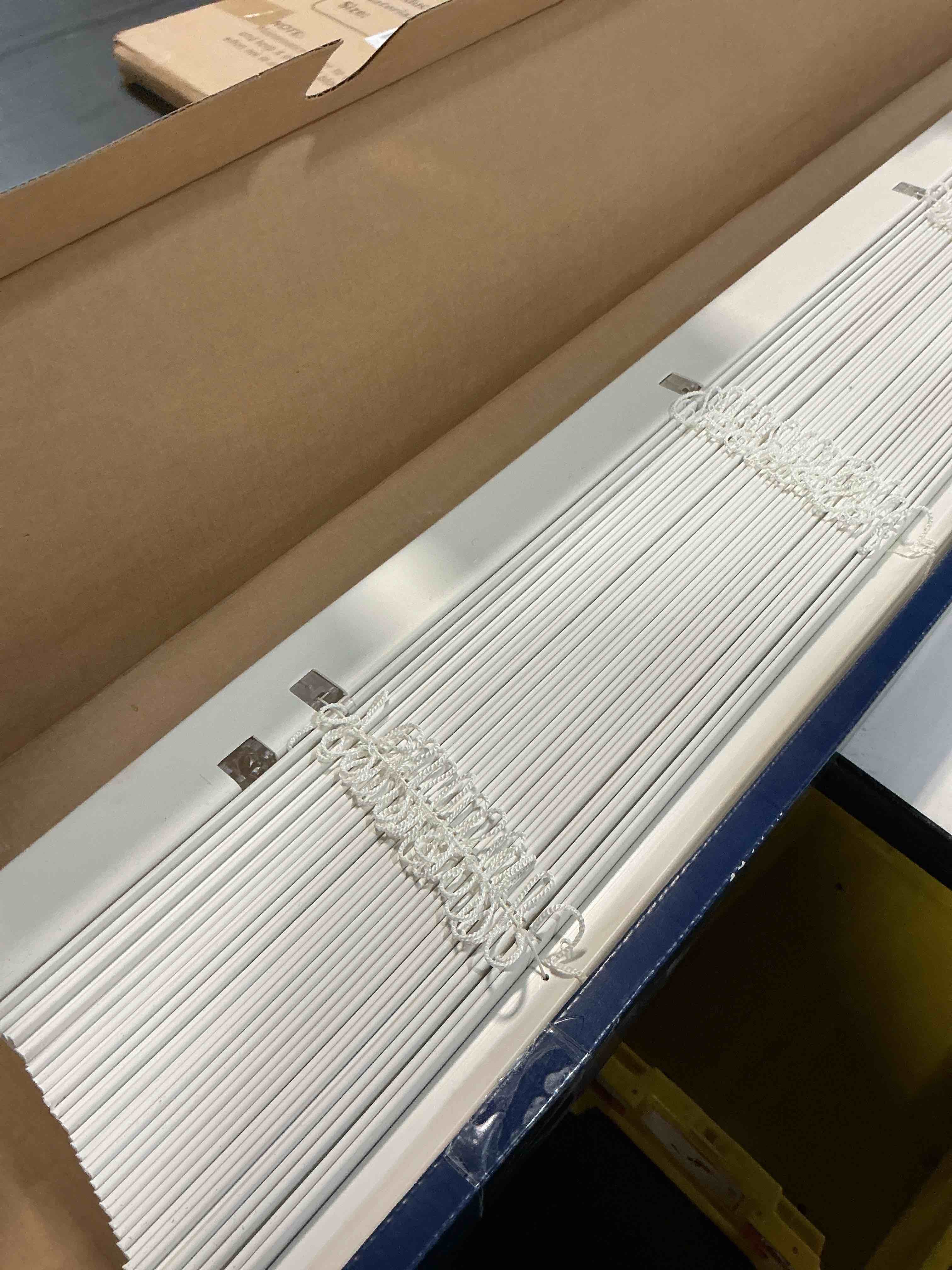 Condition photo showing As Is for levolor trim+go 2-in slat width 23-in x 72-in cordless white faux wood room darkening