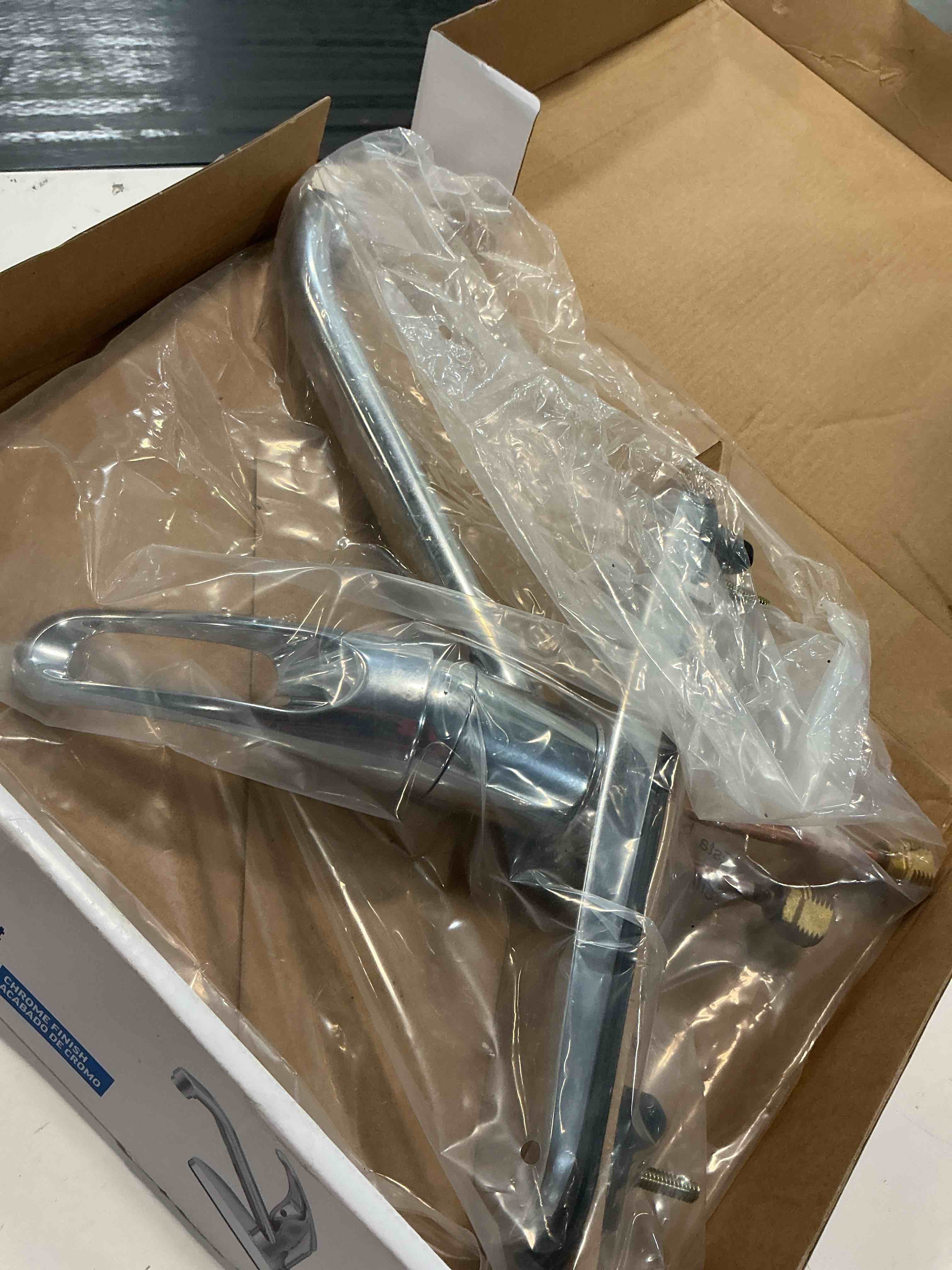 Condition photo showing As Is for project source wakebridge chrome single handle deck-mount kitchen faucet (includes deck plate)