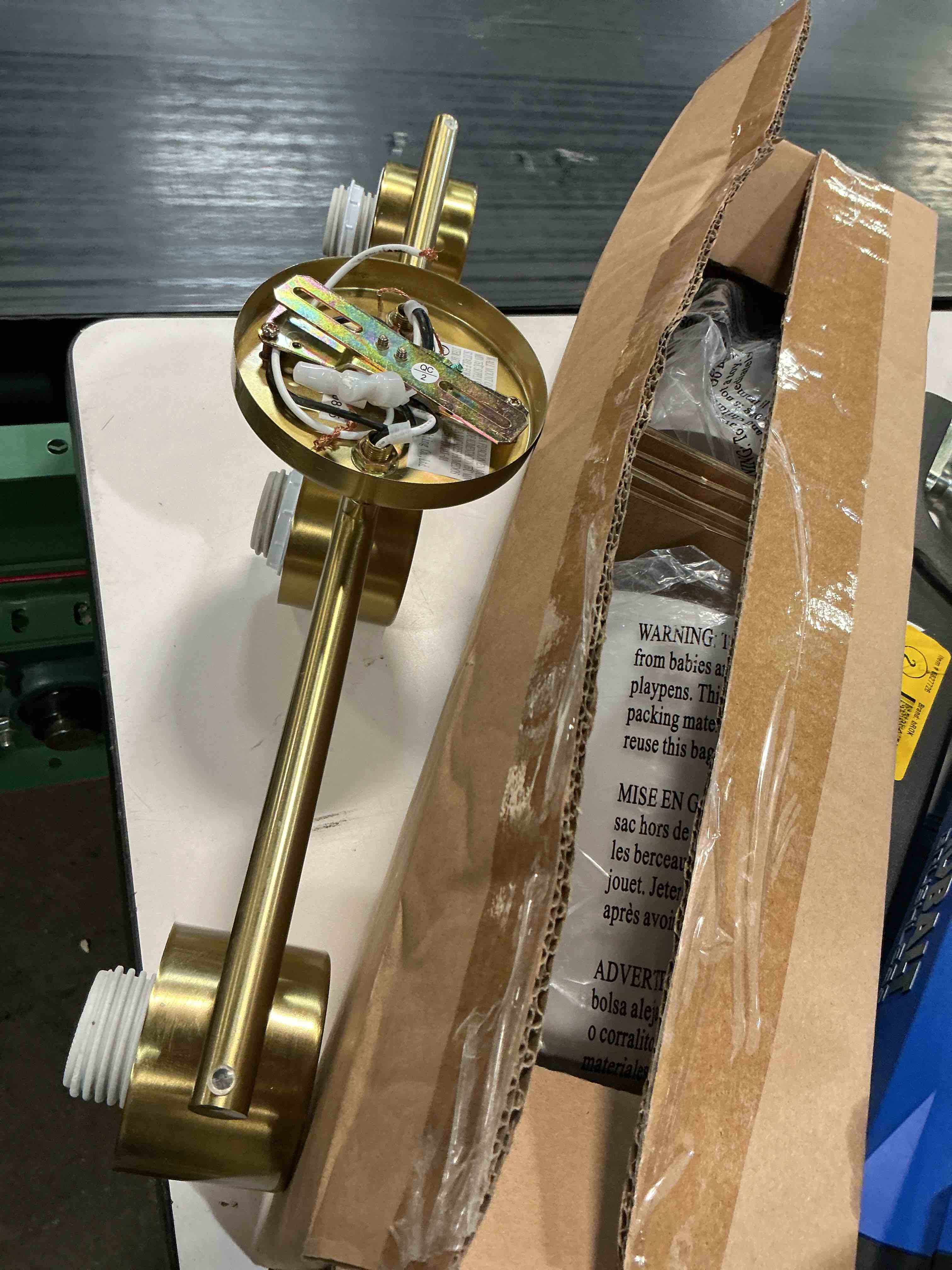 Condition photo showing As Is for (incomplete) origin 21 elleson 22-in 3 light brushed gold modern/contemporary bathroom vanity light