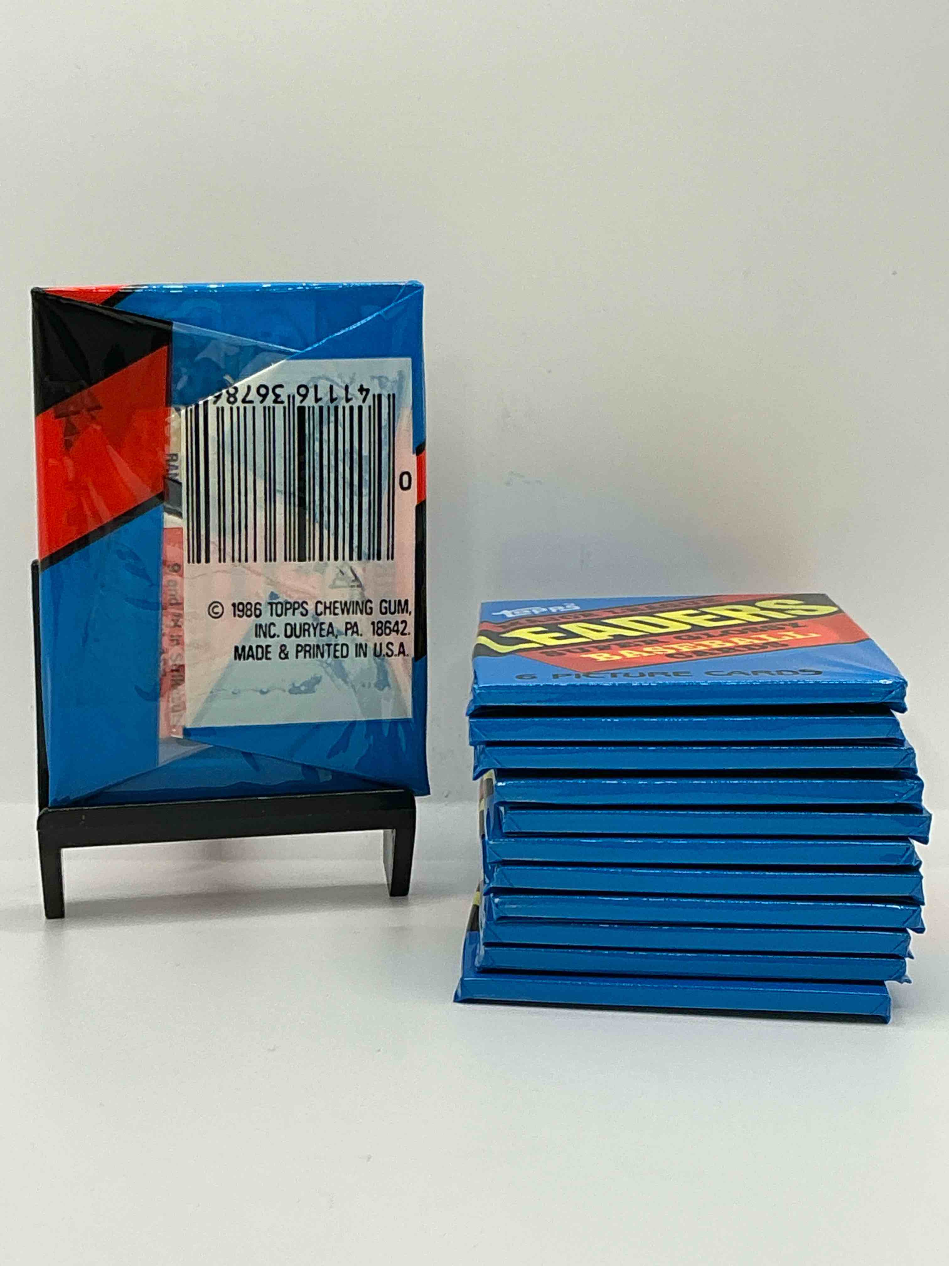Condition photo showing New/Like New for ultra rare! 1986 "mlb leaders" unopened miniature baseball collectible card packs, 6 cards per pack, direct from original retail case. super rare, impossible to find! like new condition!