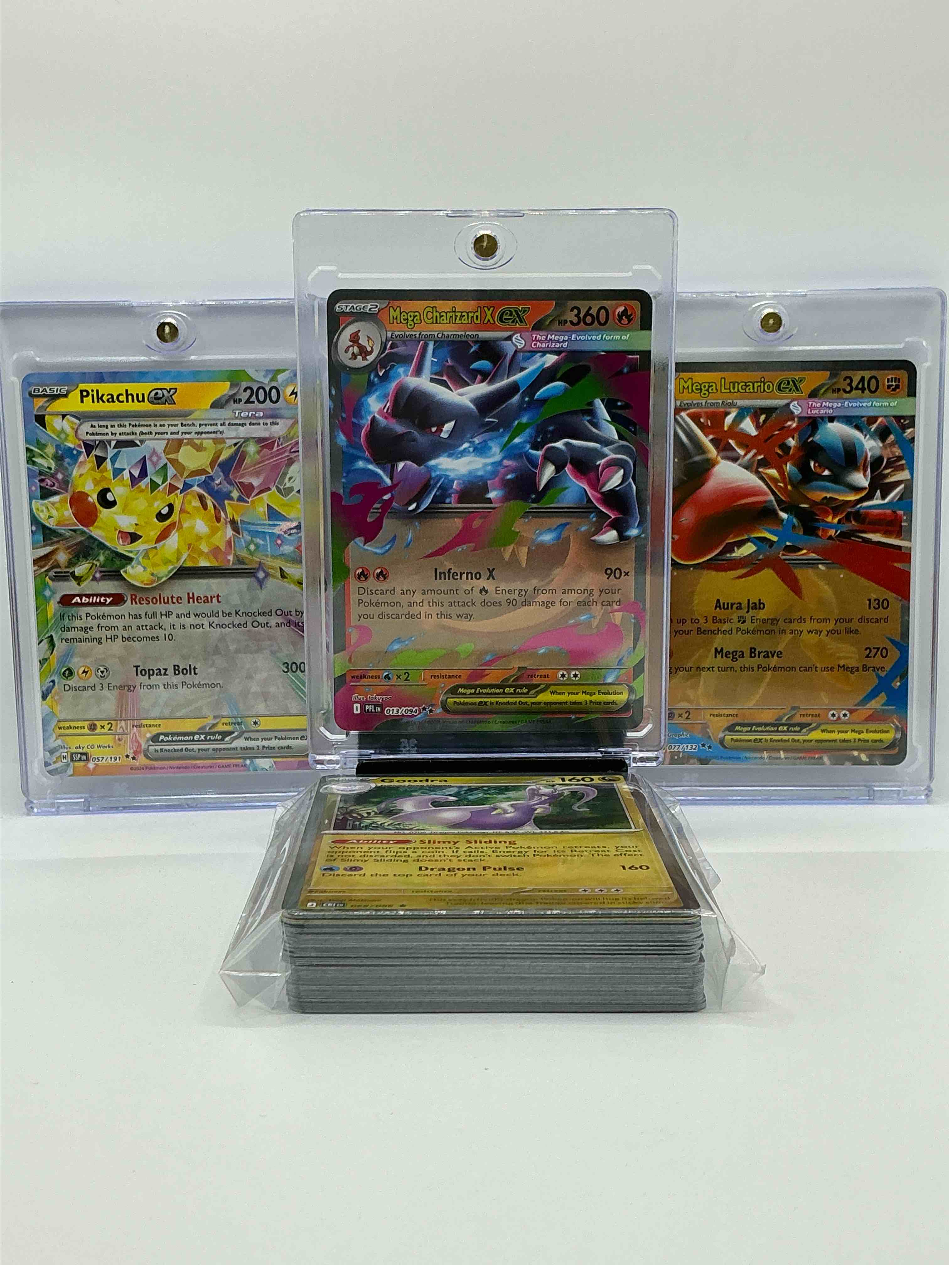 Condition photo showing New/Like New for charizard, pikachu, lucario & more! along with 50 other pokémon heroes, holos, legends & commons- including holographic cards, stage 2 cards, holos in all forms & more! also includes 36 non holo common/ uncommon basic & first stage cards trainers & energy too! perfect set for collectors & enthusiasts!