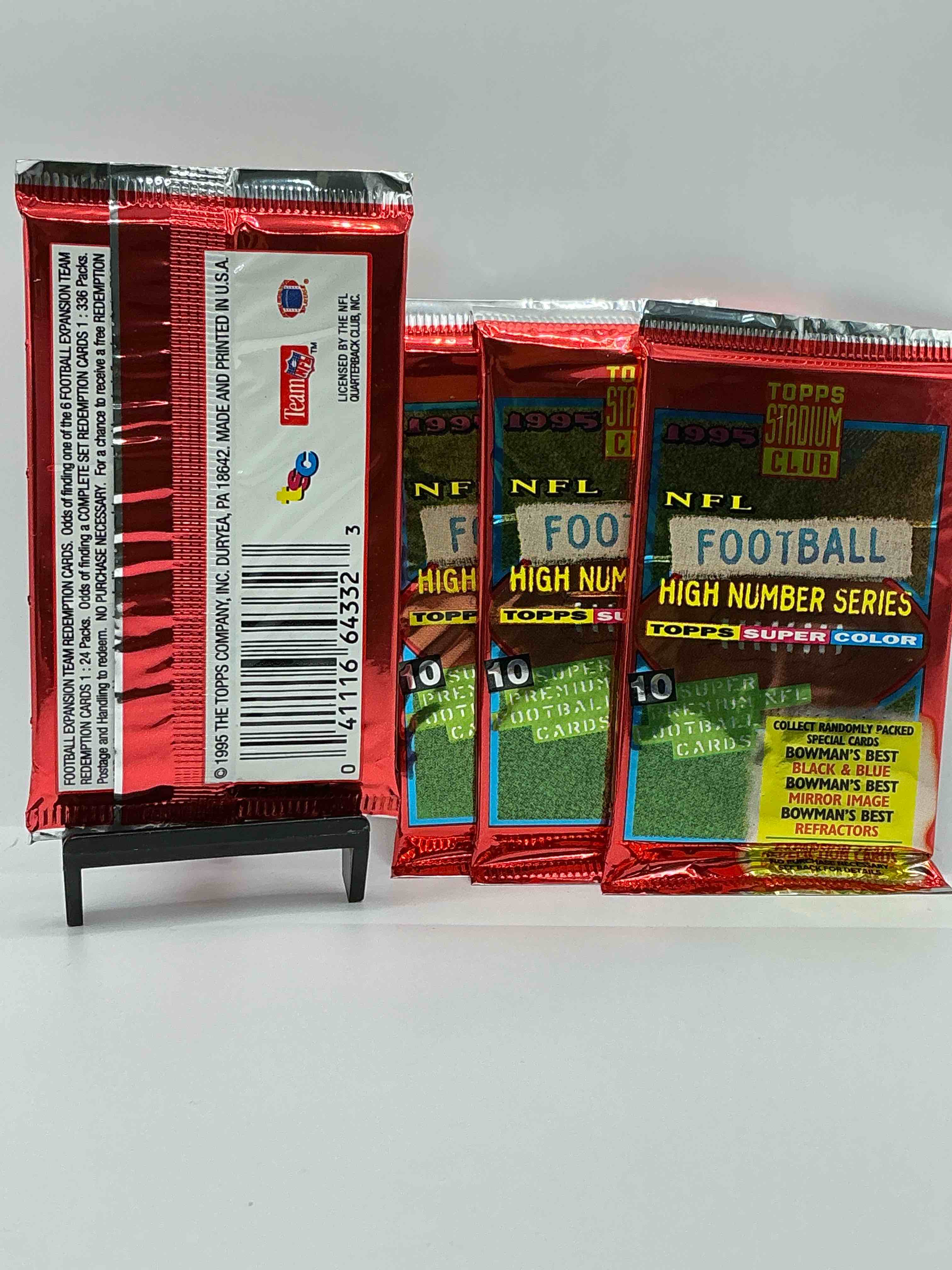 Condition photo showing New/Like New for 1995 nfl football high number series topps stadium club super color! 10 super nfl football cards! collect randomly packed cards, bowman’s best, black & blue, mirror image, refractors & more! rare packs!