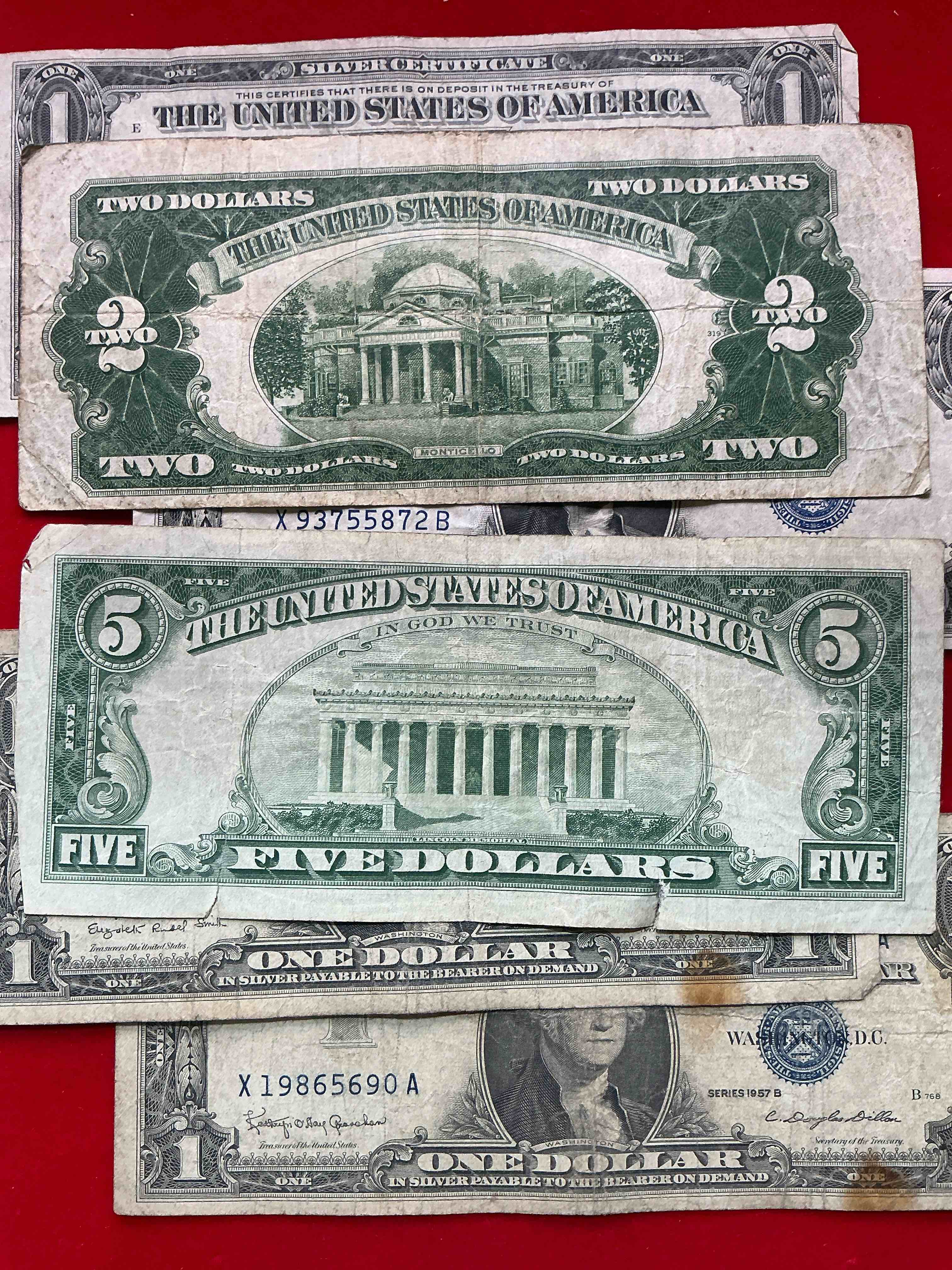 Condition photo showing New/Like New for rare american dollar bills! red seal five dollar bill & red seal two dollar bill, along with silver certificates! five dollar bill ultra rare & in good condition, red seal two dollar bill in good condition & silver certificates produced from 1878 to 1964 & are still considered legal tender at face value. here are gorgeous, circulated 1935 & 1957 u.s. one dollar silver certificate, with highly collectible "blue seal!* own an awesome piece of history! american dollar lot! 