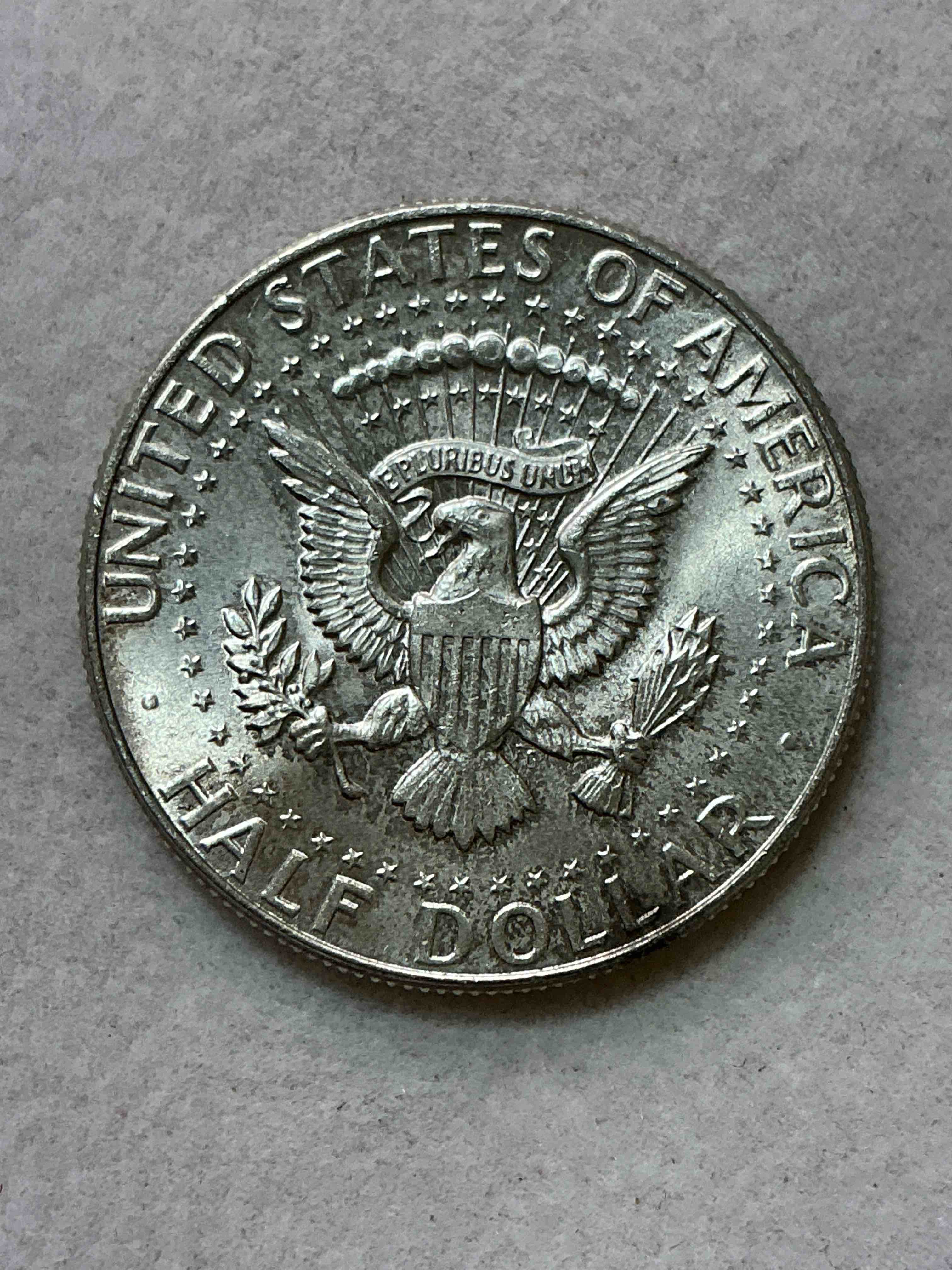 Condition photo showing New/Like New for 1964 rare uncirculated kennedy 90% silver wow! did you know that 1964 is the only year kennedy half dollars are 90% silver?! when jfk was assassinated in 1964the u.s. mint rushed to make a coin in his honor. they replaced the franklin half dollar with a kennedy version in 1964. after 1964 kennedy half dollars were made with 40% silver before eventually having no silver at all. 1964 is the year to collect kennedy half dollars if you are investing in u.s. fine silver! check out this rare 1964 kennedy half dollar in excellent condition!