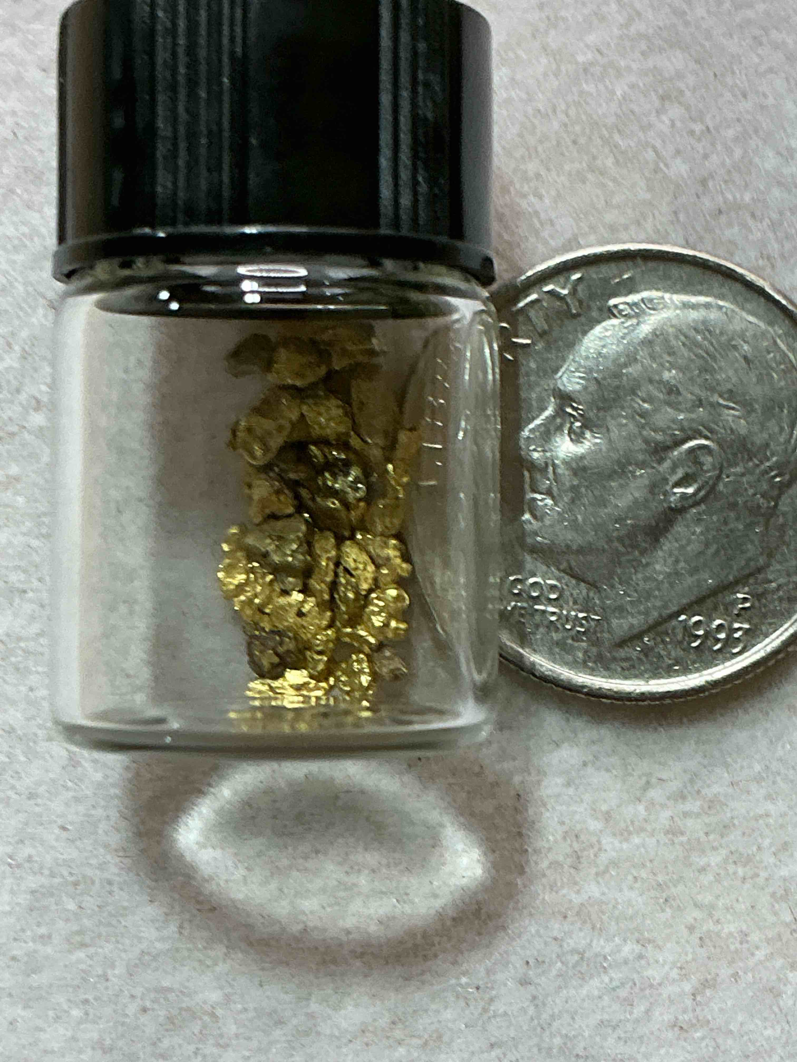 Condition photo showing New/Like New for genuine gold nuggets!  approximately 1 gram of prospected gold nuggets! gold nuggets fresh from prospecting north carolina mountains, total weight of all nuggets is approximately 1 gram! these gold nuggets test at between approx 22-24 karat. gold in raw, prospected form is extremely hard to find & much rarer than any refined form. get in on the gold craze... gold has increased in value over 40% since 2025! u.s. dime for size reference only (not included). case in image included. own genuine, gold nuggets! 