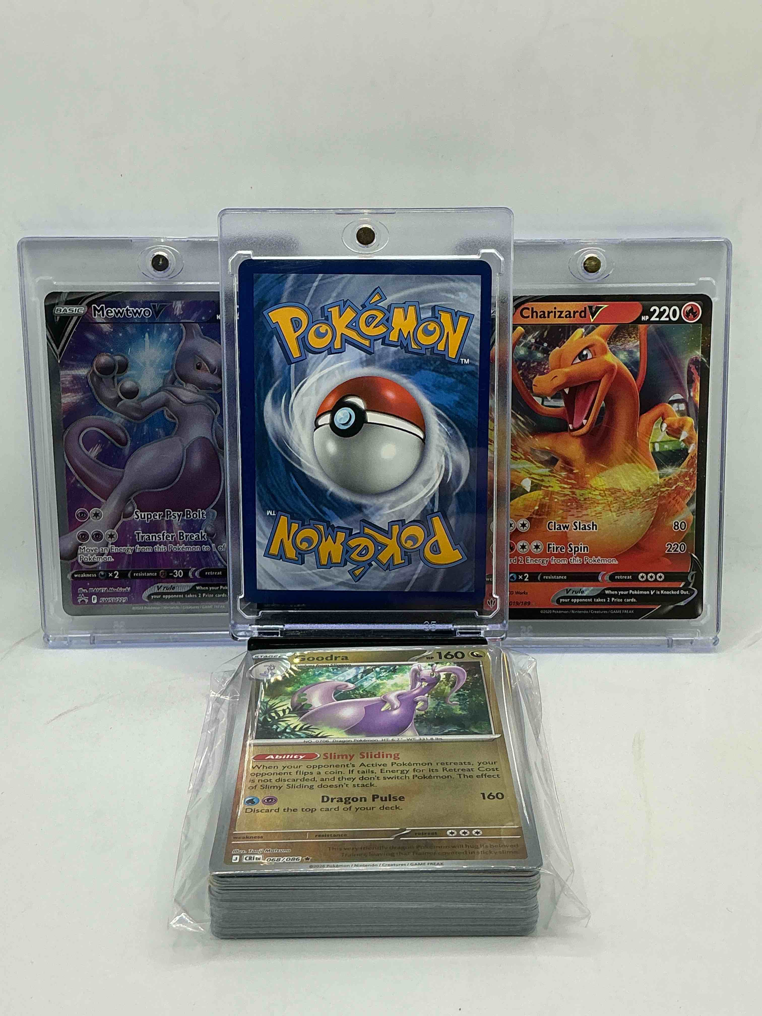 Condition photo showing New/Like New for flying pikachu v! mewtwo v! charizard v! along with 50 other pokémon heroes, holos, legends & commons- including holographic cards, stage 2 cards, holos in all forms & more! also includes 36 non holo common/ uncommon basic & first stage cards trainers & energy too! perfect set for collectors & enthusiasts!
