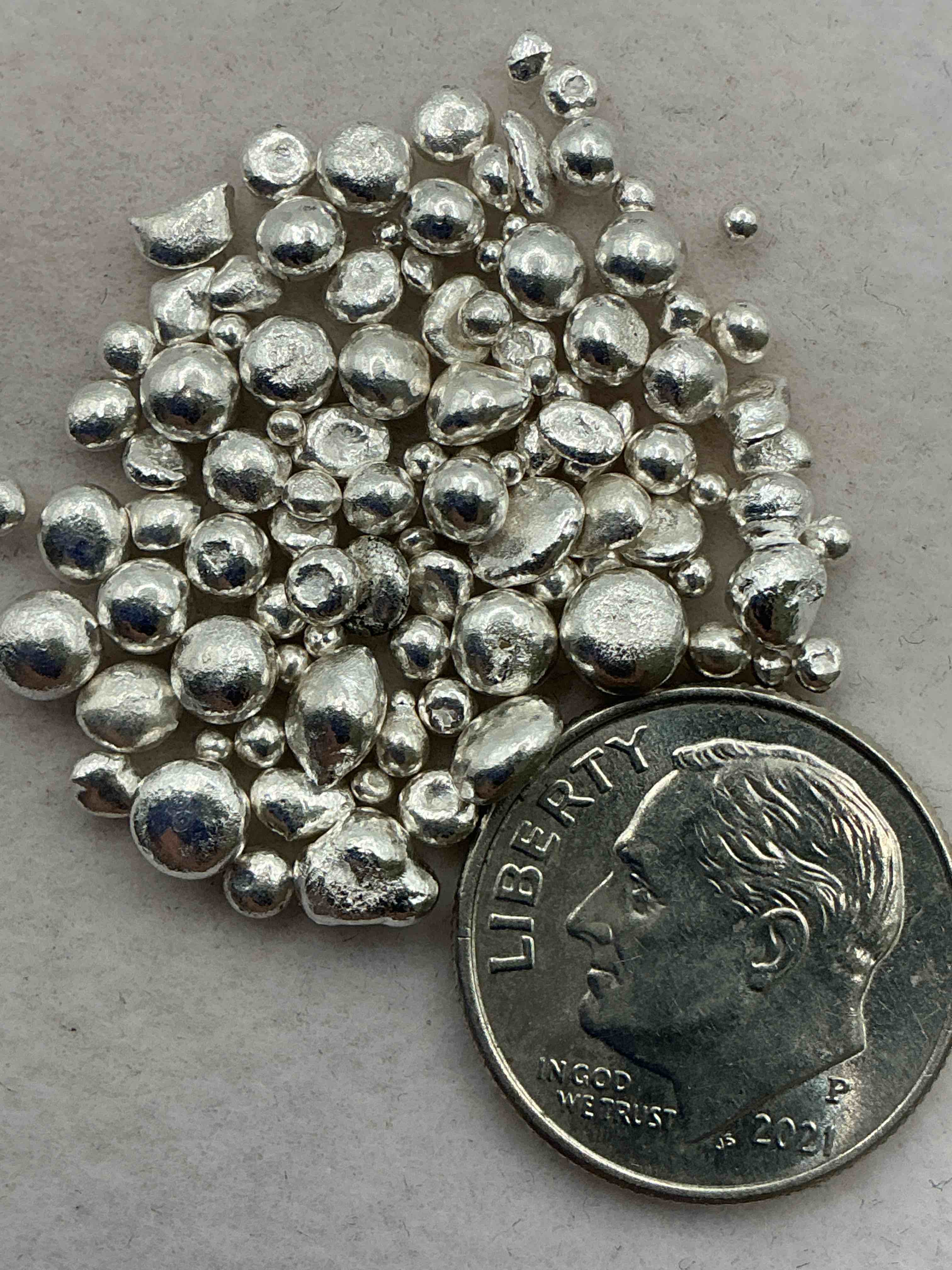 Condition photo showing Good Condition for silver nuggets! .999 us fine silver, in small nugget form! total weight of all nuggets in lot approximately 9 grams, bid is per nugget! a cool way to invest in fine us silver! includes collector capsule!