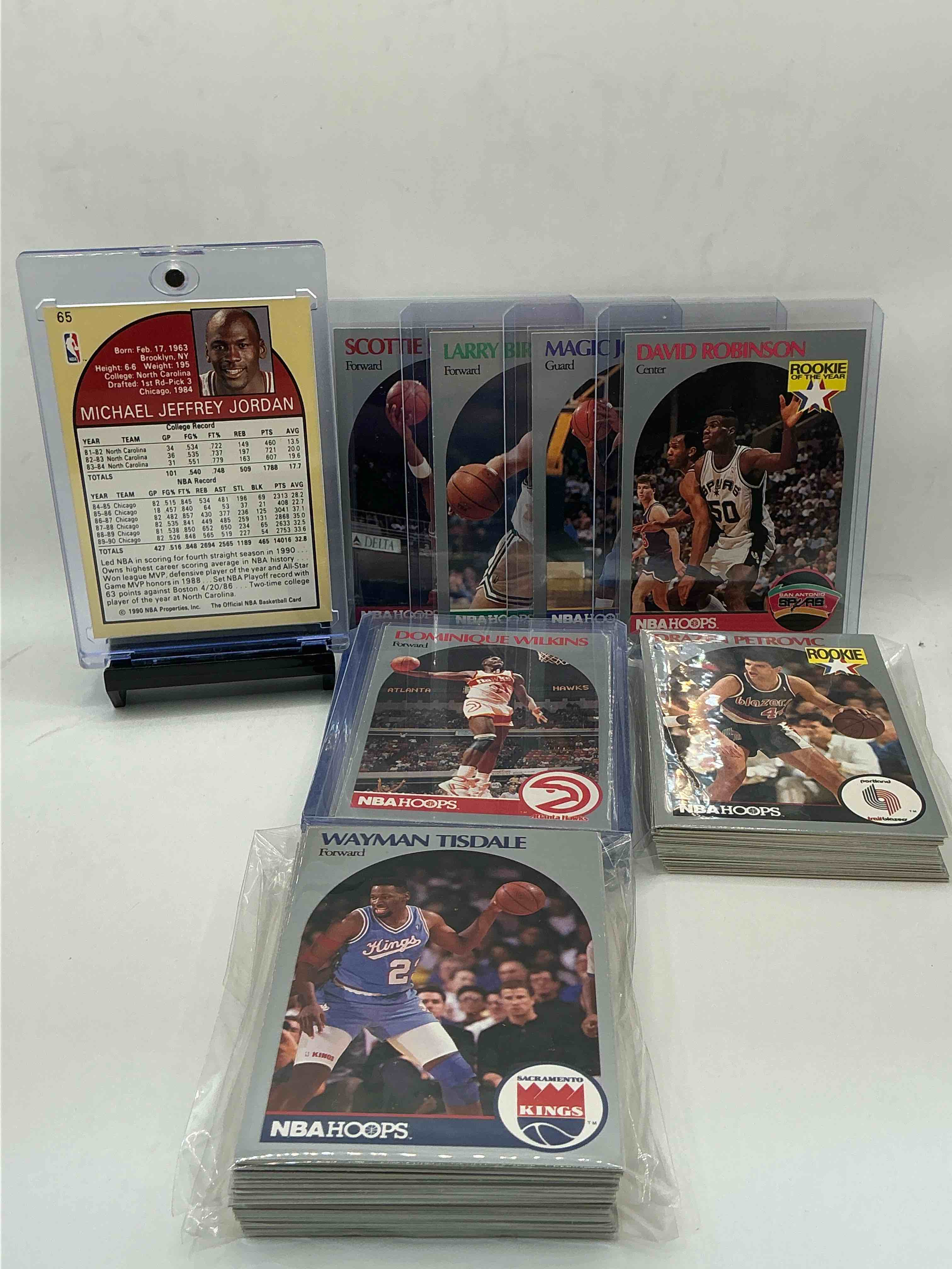 Condition photo showing New/Like New for michael jordan! 1990 nba hoops 100 card basketball! the best cards from the year! michael jordan, magic johnson, larry bird, scottie pippen, david robinson, charles barkley, karl malone, clyde drexler & more! all stars, hall of famers, champions & more, the perfect mix of miscellaneous '90 nba variety!