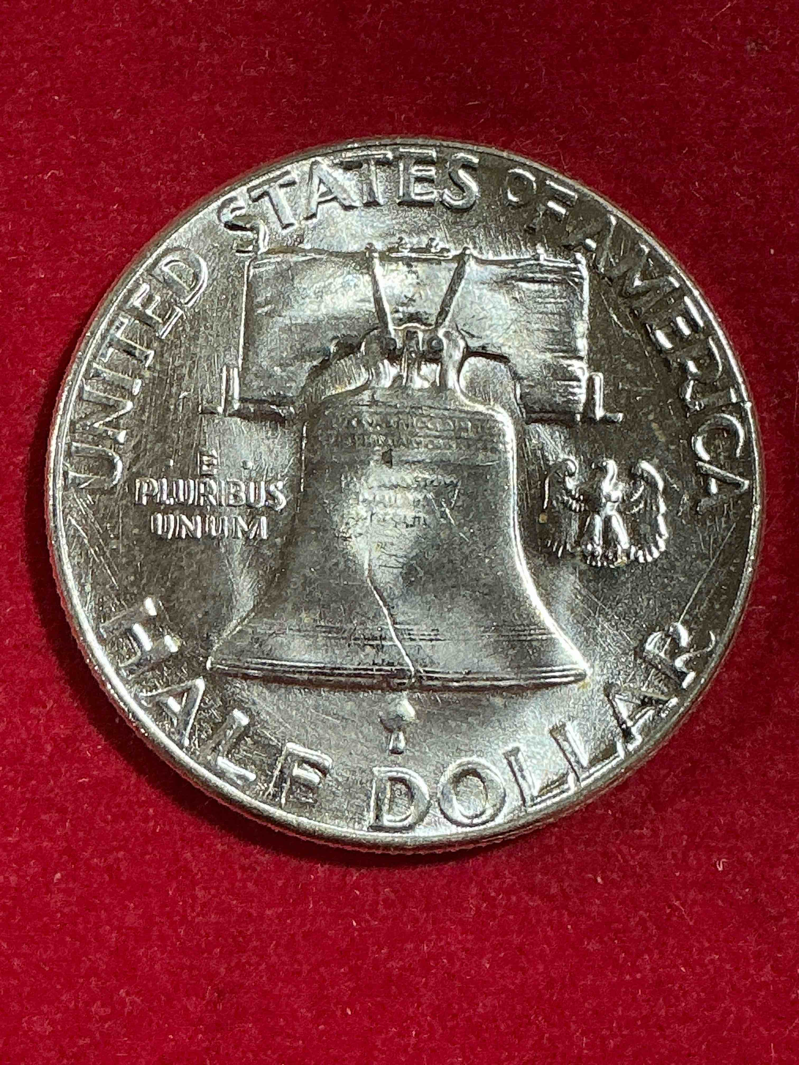 Condition photo showing Good Condition for ben franklin silver! pre 1965 silver u.s. half dollar coin! before 1965 american half dollars were actually silver, here is a rare 1955 version in good condition! great for investing in precious metals! these heavy half dollars were minted at 90% silver and 10% copper, giving them a net weight of .36169 ounces of pure silver per coin! very rare in this great condition!