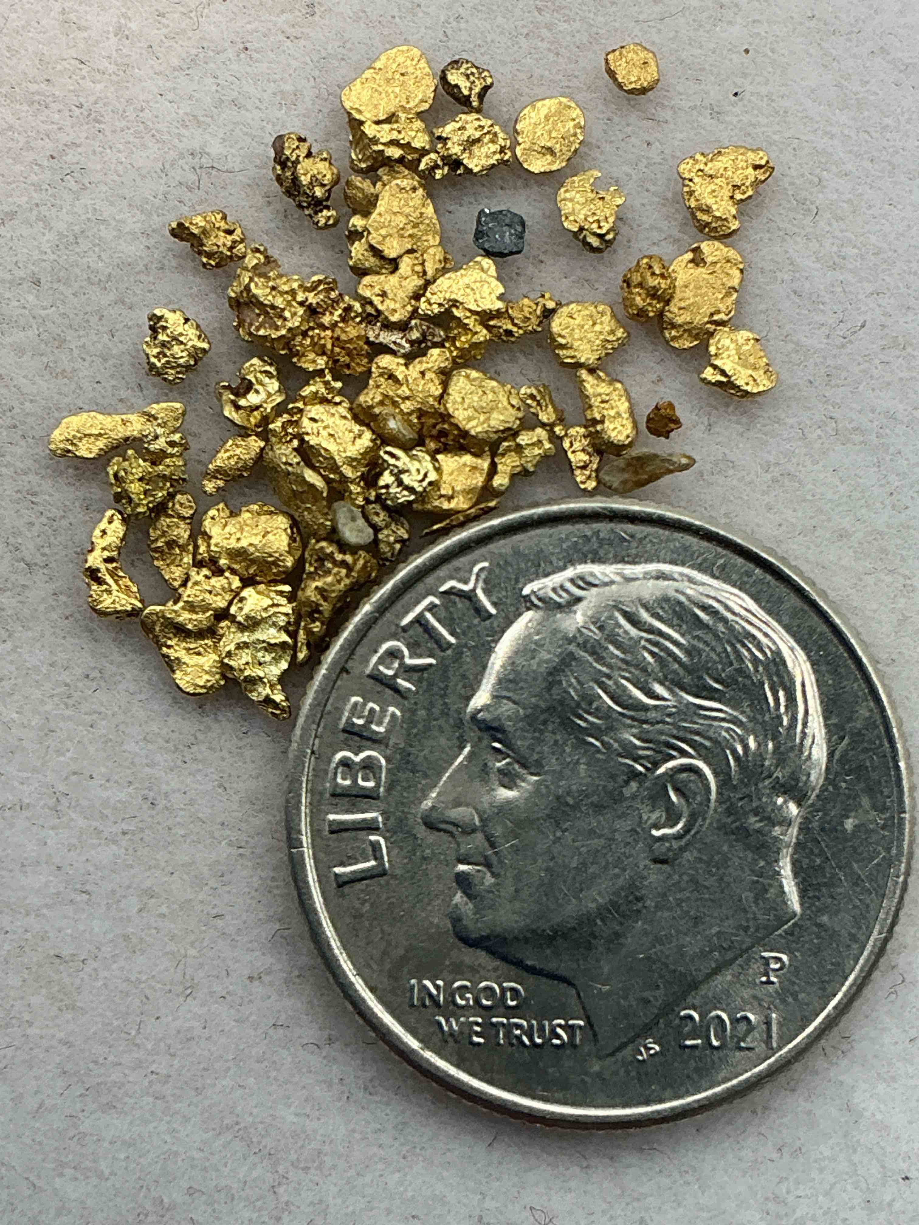 Condition photo showing Good Condition for genuine gold nuggets!  approximately 1 gram of prospected gold nuggets! gold nuggets fresh from prospecting north carolina mountains, total weight of all nuggets is approximately 1 gram! these gold nuggets test at between approx 22-24 karat. gold in raw, prospected form is extremely hard to find & much rarer than any refined form. get in on the gold craze... gold has increased in value over 40% since 2025! u.s. dime for size reference only (not included). case in image included. own genuine, gold nuggets! 