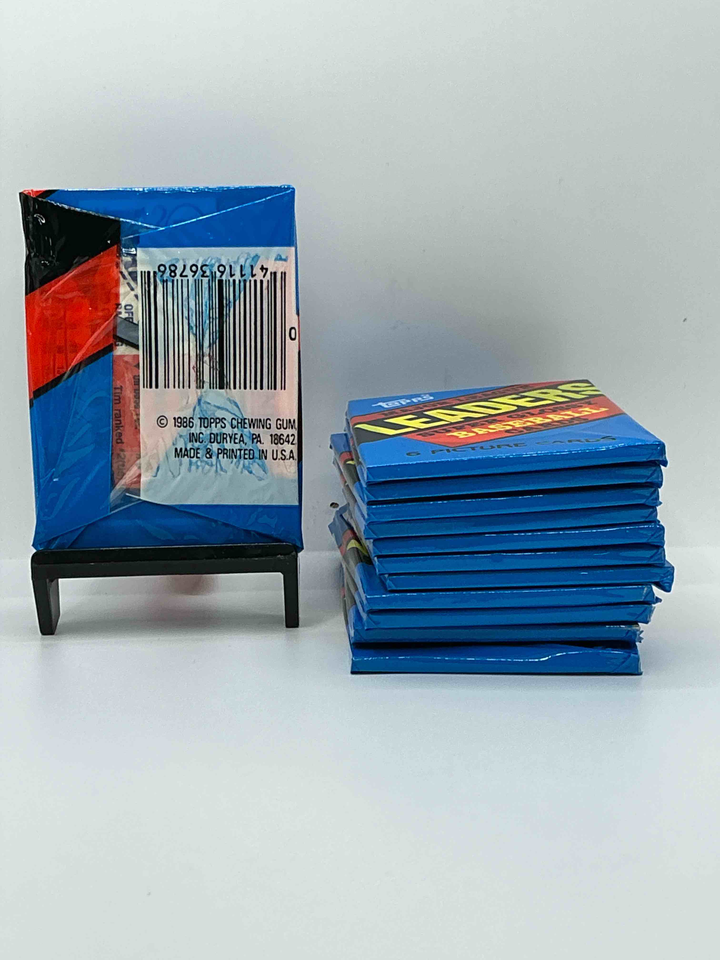 Condition photo showing New/Like New for ultra rare! 1986 "mlb leaders" unopened miniature baseball collectible card packs, 6 cards per pack, direct from original retail case. super rare, impossible to find! like new condition!