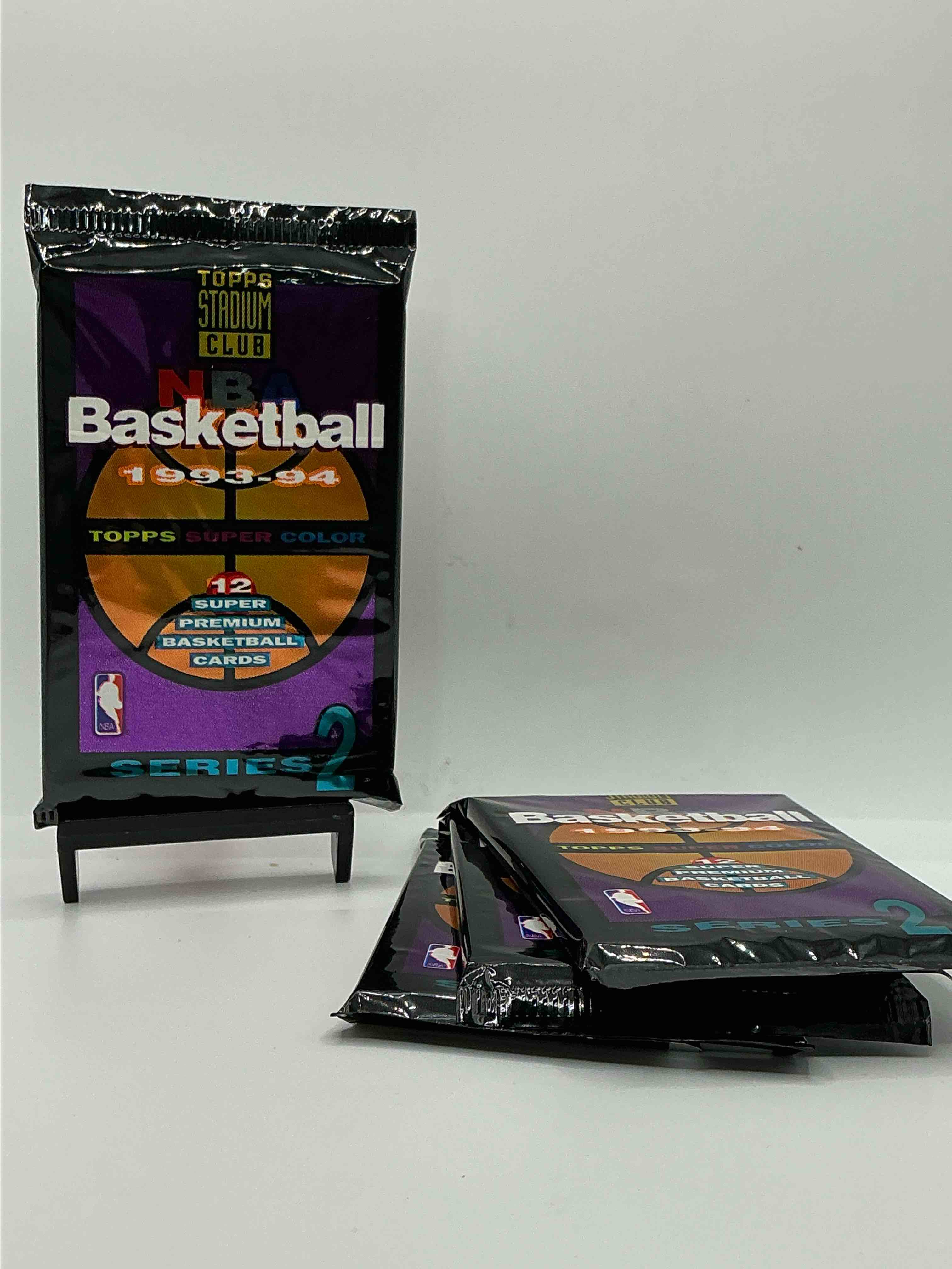 nba bonanzal 1993- 94 topps stadium club series 2 basketball packs! 12 premium basketball cards in each packl search for legends & rookies alikel look for michael jordan, shag o'nell, hakeem olajuwon & more ist day issue cards, frequent flyer cards, members only cards & rookies from hardaway & webber! possible pippen, magic, jordan, robinson, shaq, olajuwon, ewing & so much more!