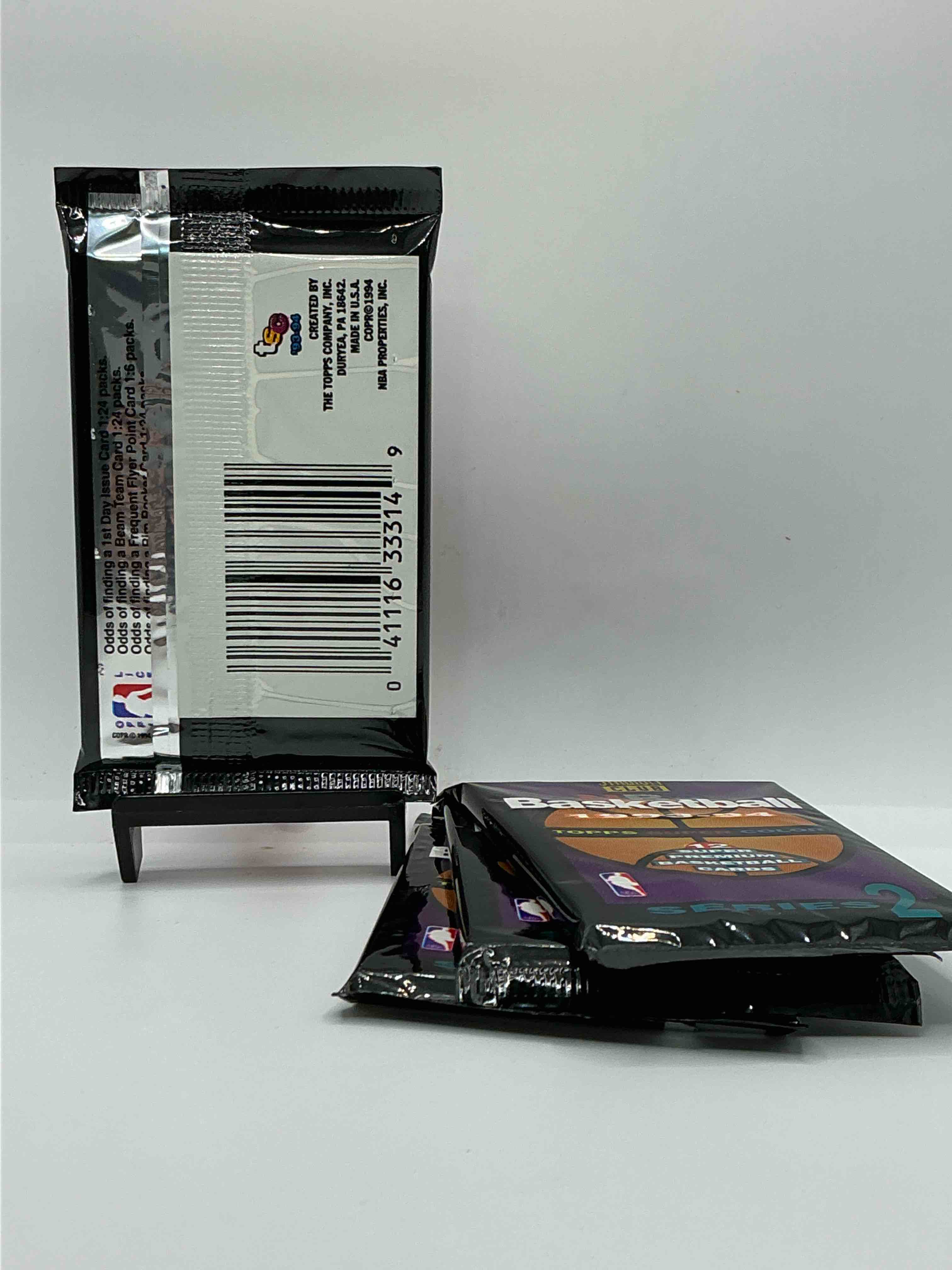 Condition photo showing New/Like New for nba bonanzal 1993- 94 topps stadium club series 2 basketball packs! 12 premium basketball cards in each packl search for legends & rookies alikel look for michael jordan, shag o'nell, hakeem olajuwon & more ist day issue cards, frequent flyer cards, members only cards & rookies from hardaway & webber! possible pippen, magic, jordan, robinson, shaq, olajuwon, ewing & so much more!