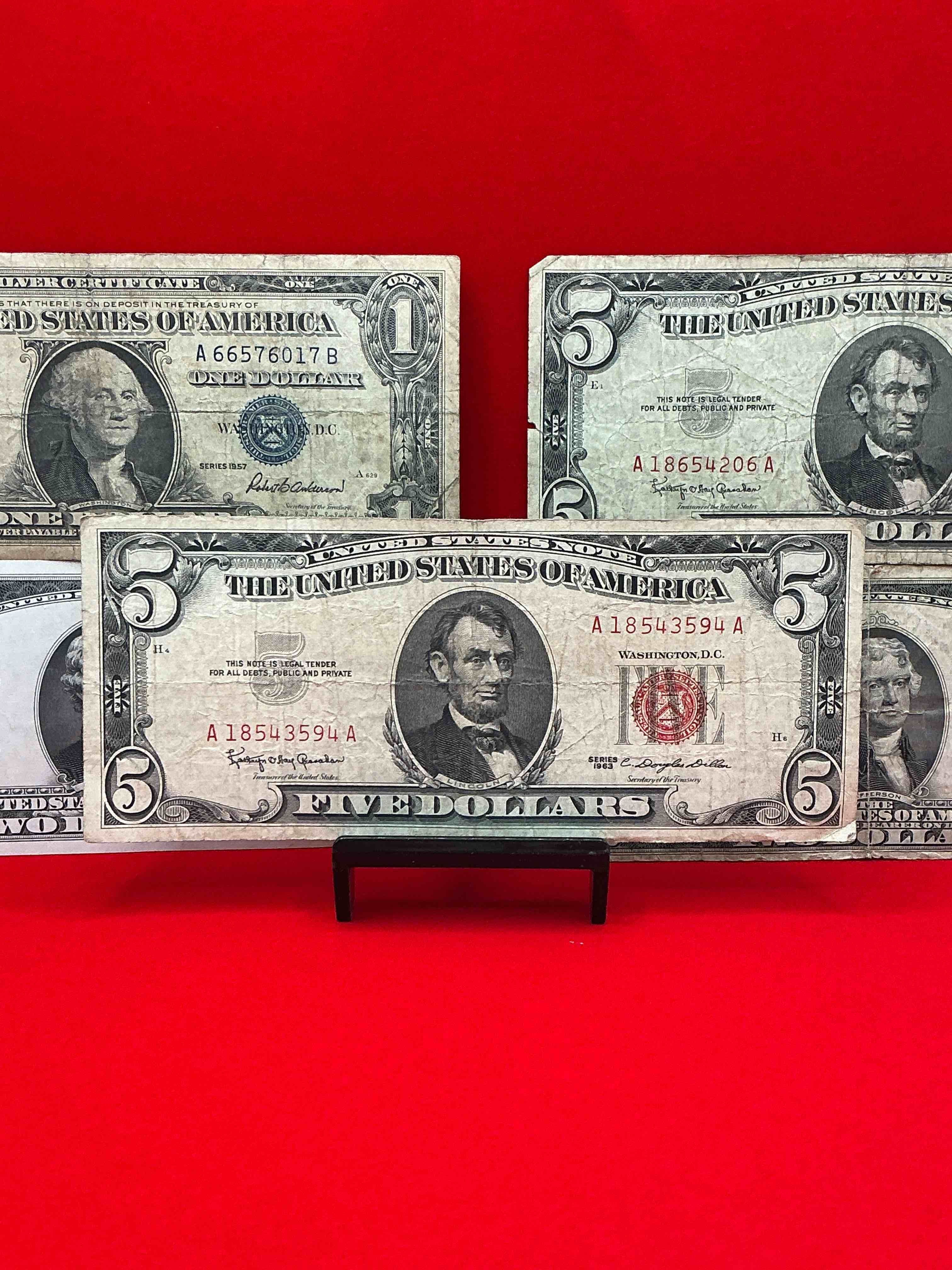Rare American Dollar Bills! RED Seal Five Dollar Bill & Red Seal Two Dollar Bill, Along With Silver Certificates! Five Dollar Bill Ultra Rare & In Good Condition, Red Seal Two Dollar Bill In Good Condition & Silver Certificates Produced From 1878 To 1964 & Are Still Considered Legal Tender At Face Value. Here Are Gorgeous, Circulated 1935 & 1957 U.S. One Dollar Silver Certificate, With Highly Collectible "Blue Seal!* Own An Awesome Piece Of History! American Dollar Lot! 
