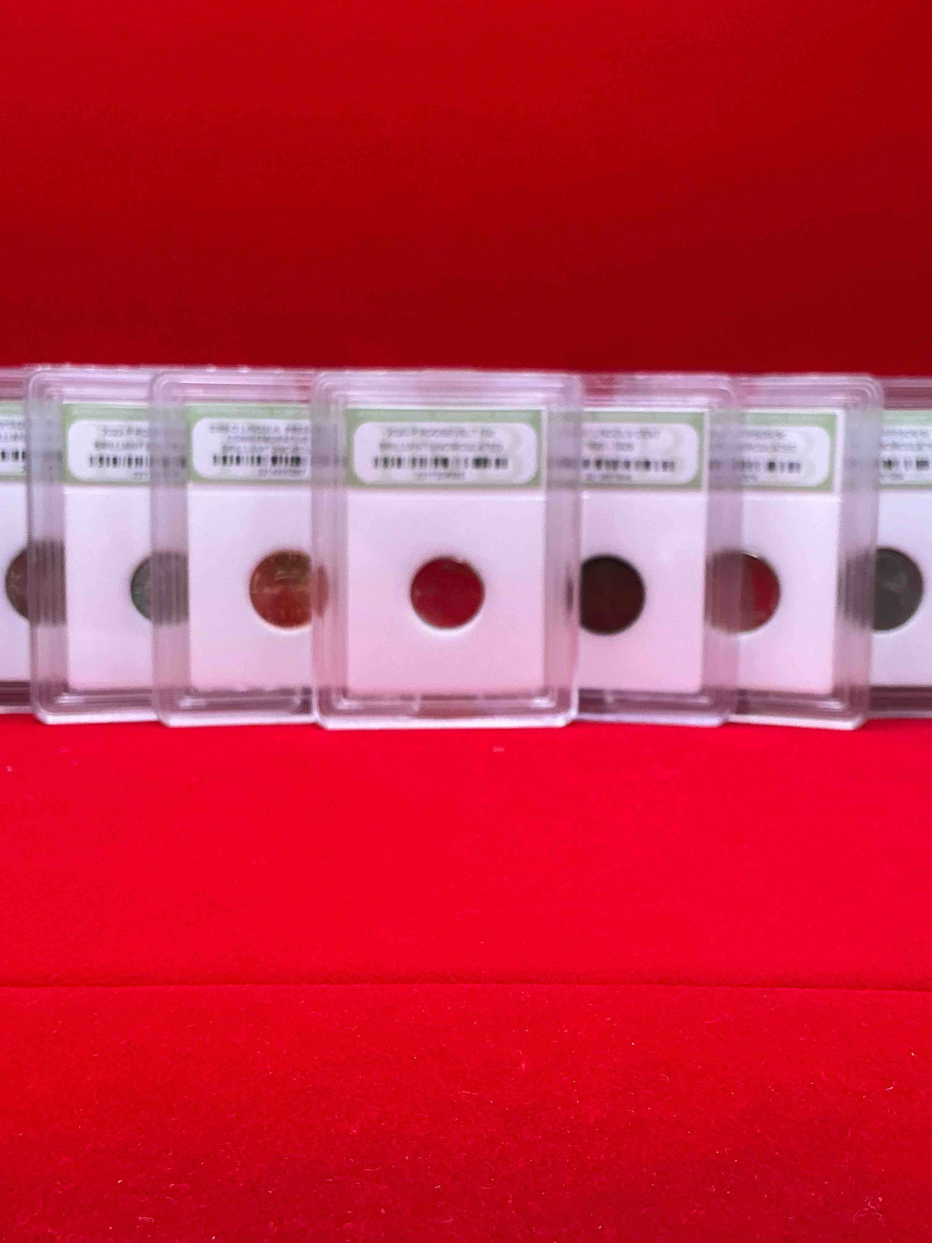 Condition photo showing New/Like New for collector's dream! 7 different rare, slabbed u.s. collector coins in certified/catalogued protective slab cases! a great way to build an incredible collection of protected, rare u.s. coins! great for the coin fan & collector!