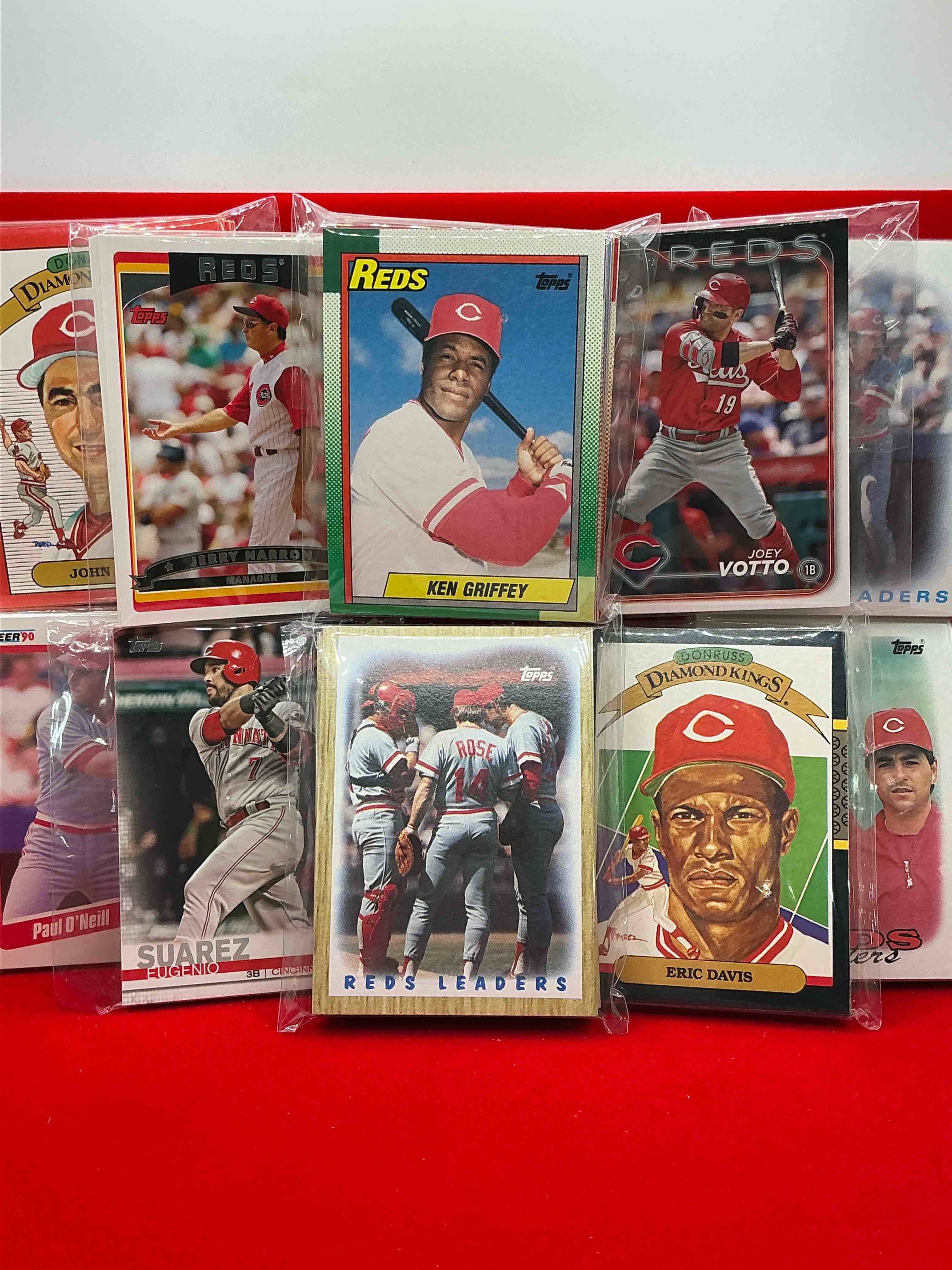 Condition photo showing New/Like New for reds team card collections! 1986, 1987, 2024, 1990, 1988 & more! super cool for cincinnati reds fans! awesome collection!