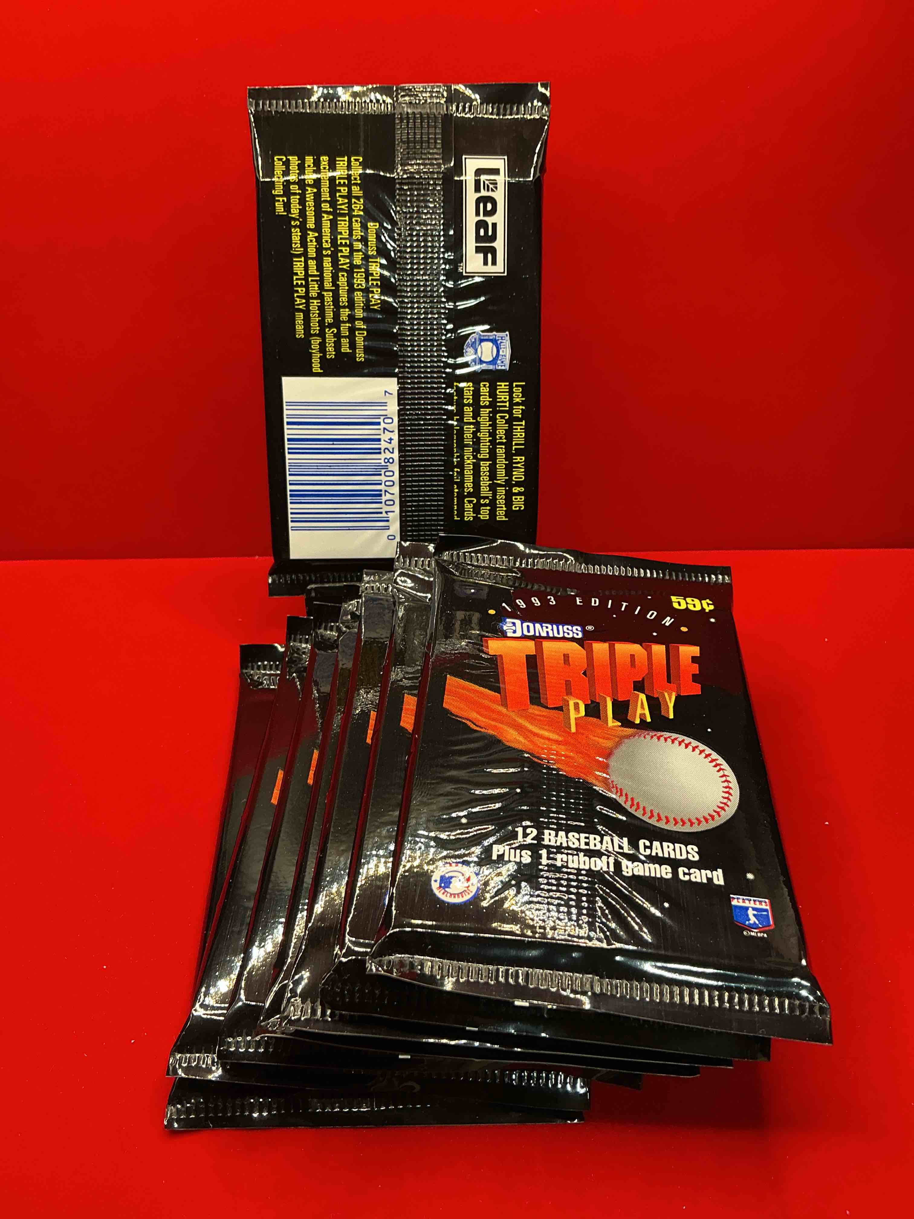 Condition photo showing New/Like New for 1993 donruss triple play mlb baseball 18 card packs! look for 1 ruboff game cards along with griffey jr, mcgwire, ryan & more! rare packs!