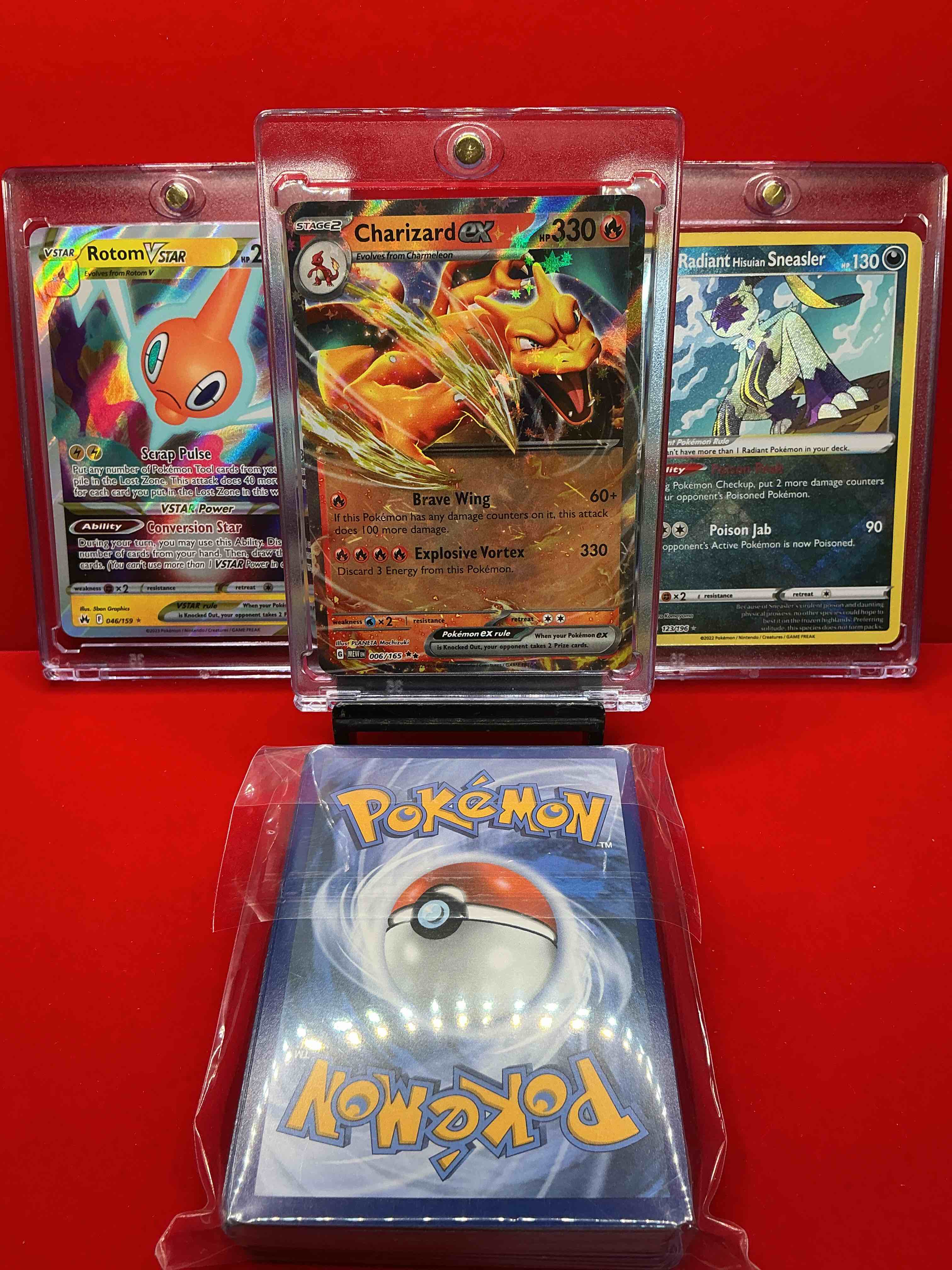 Condition photo showing New/Like New for pokémon! charizard ex! rotom v star! radiant sneasler! along with 50 other pokémon heroes, holos, legends & commons- including holographic cards, stage 2 cards, holos in all forms & more! also includes 36 non holo common/ uncommon basic & first stage cards trainers & energy too! perfect set for collectors & enthusiasts!