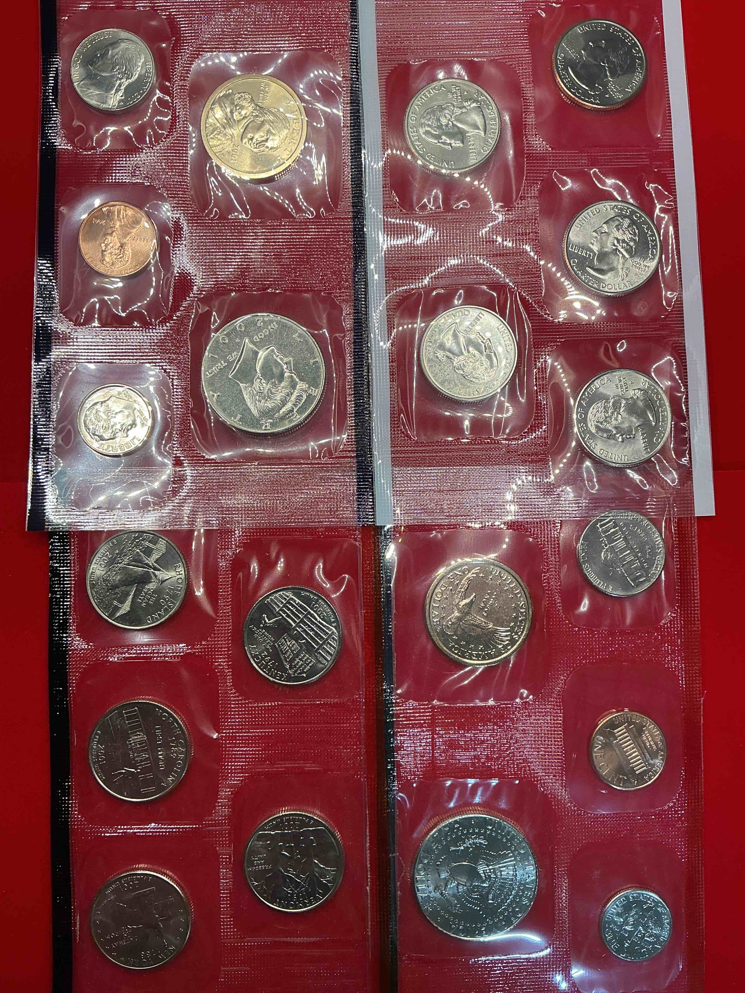 Condition photo showing New/Like New for 2001, the year the world changed forever. here are gorgeous 2001 u.s. mint set uncirculated coins. includes 20 coins, each coin minted that year to include the 10 state quarters issued that year, philadelphia & denver mints. half dollars, state quarters, one dollar coins & more! own an incredible collector item & an important piece of history.
