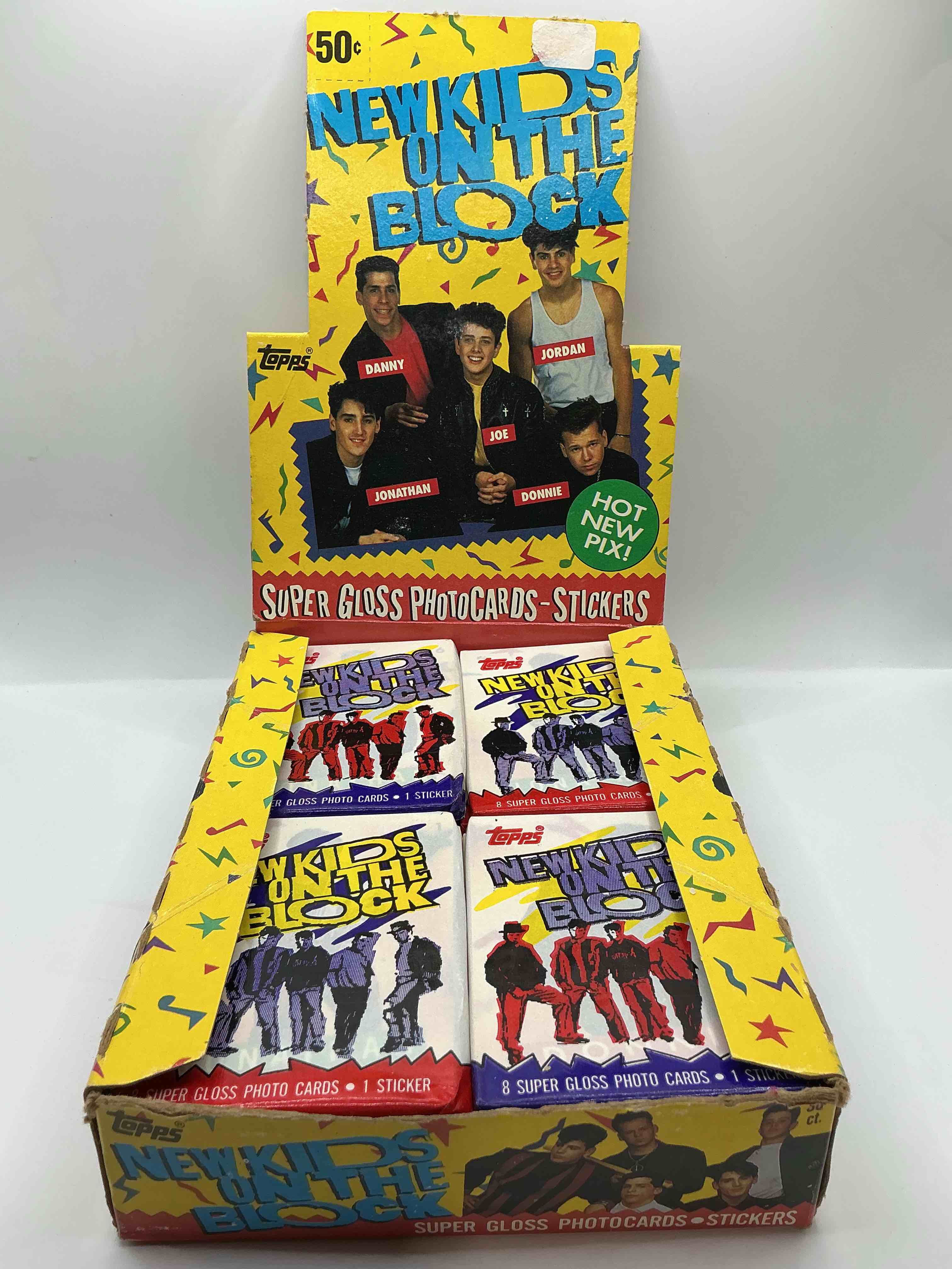 Condition photo showing New/Like New for 1989 hangin’ tough!  new kids on the block, the original boy band history!  check out these original, sealed new kids trading card wax packs, direct from original retail case!  re-live 1989 with these highly collectible, authentic pieces of pop culture history!  