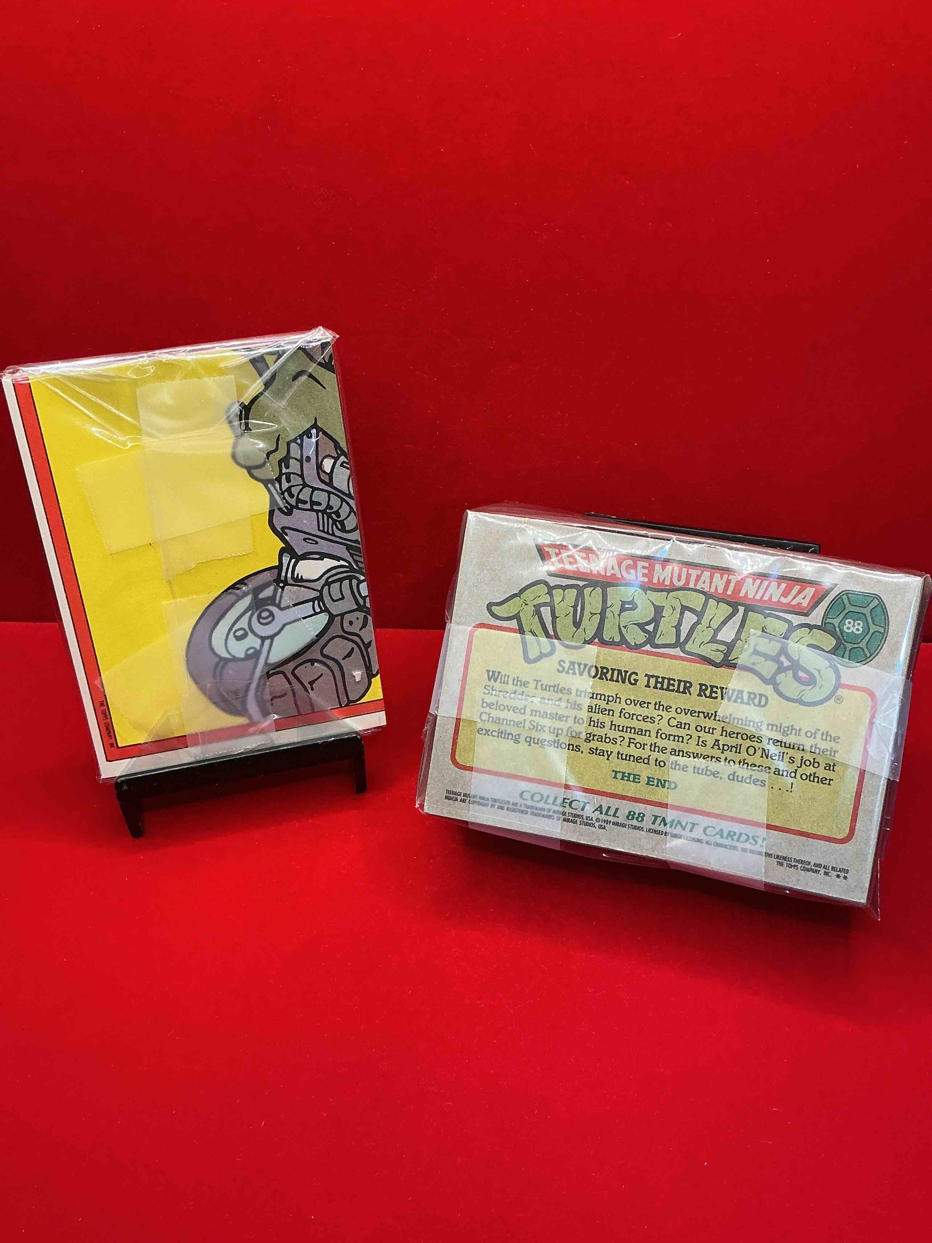 Condition photo showing New/Like New for 1989 ninja turtle wow! totally complete original, authentic teenage mutant ninja turtles complete trading card & stickers! all 88 cards & 11 stickers included, for a total qty of 99! excellent condition! your chance to own a genuine tmnt original serious collectible!