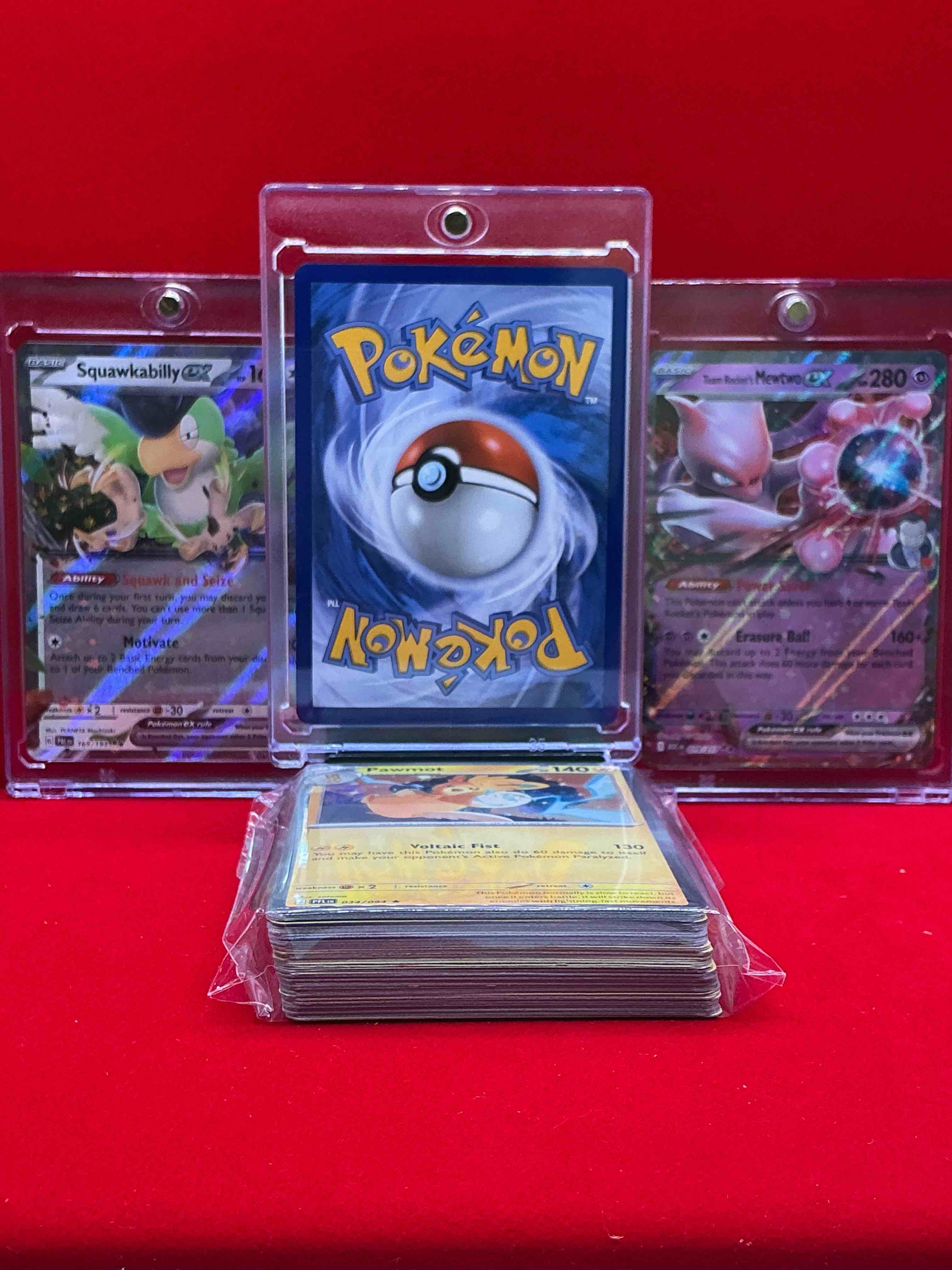 Condition photo showing New/Like New for charizard ex, mewtwo ex, squawkabilly ex & more! along with 50 other pokémon heroes, holos, legends & commons- including holographic cards, stage 2 cards, holos in all forms & more! also includes 36 non holo common/ uncommon basic & first stage cards trainers & energy too! perfect set for collectors & enthusiasts!