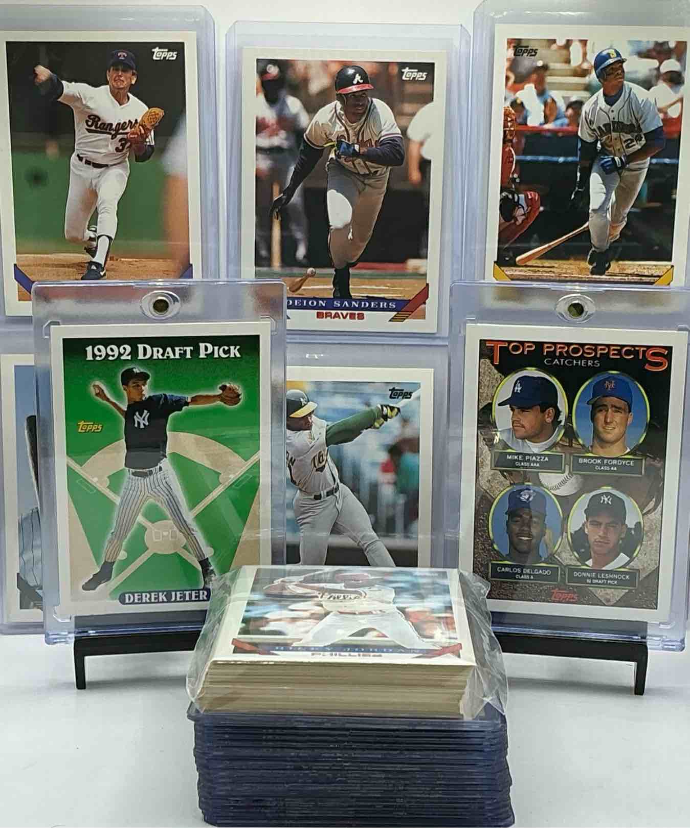 derek jeter rookie! wow… 1993 topps baseball 50 card lot! derek jeter & mike piazza rookie… along with legends, heroes, all stars, hall of famers, rookies & more! ken griffey jr, deion sanders, kirby puckett, bo jackson, rickey henderson, ryne sandberg, tom glavine, barry bonds, greg maddux, frank thomas & more! 50 card baseball!