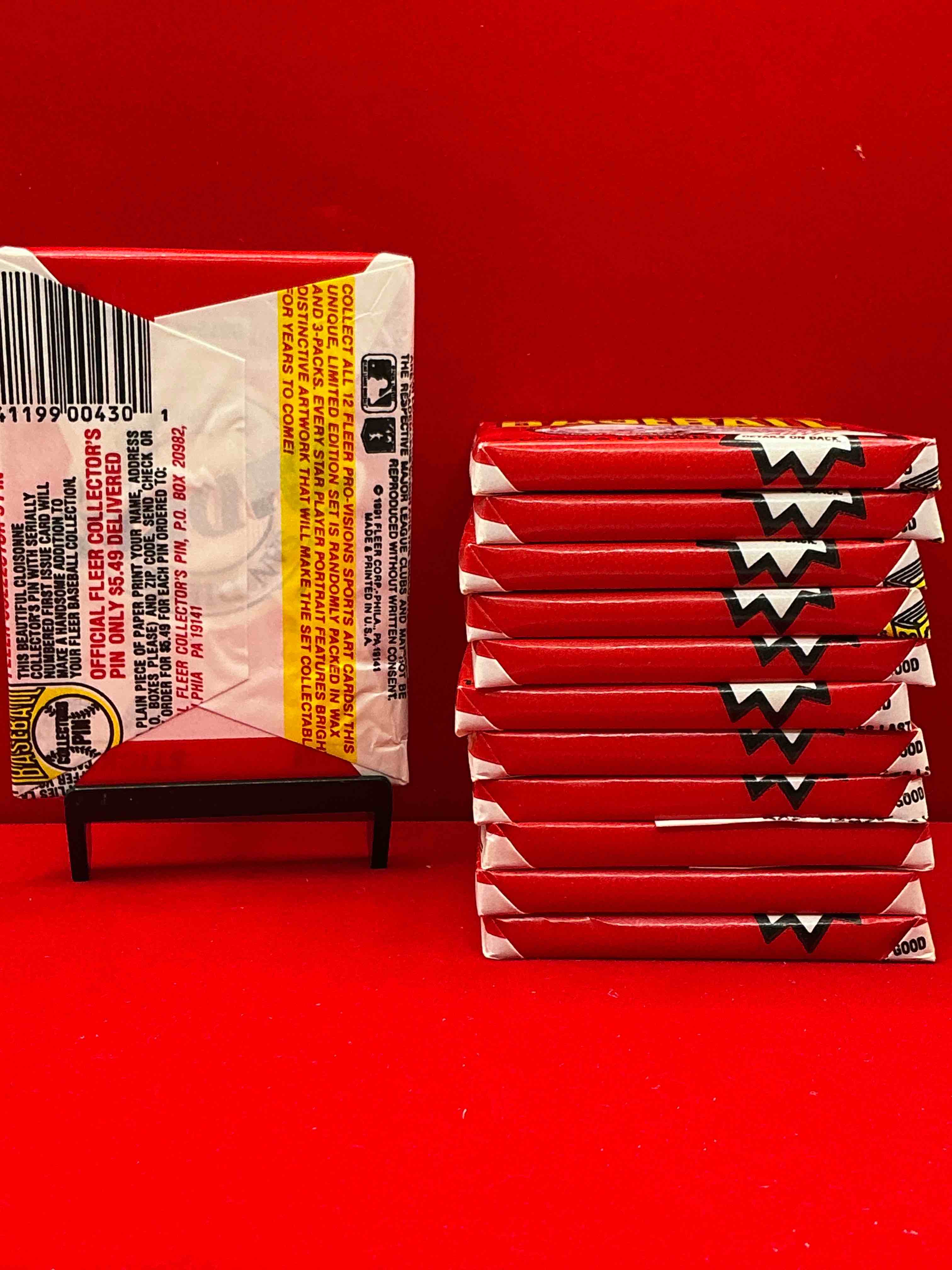 Condition photo showing New/Like New for 1991 fleer baseball unopened wax pack, direct from original sealed retail case search for griffey jr. & barry bonds "generation stars" combo card #710 (psa 10 value $200), nolan ryan, don mattingly & so much more!