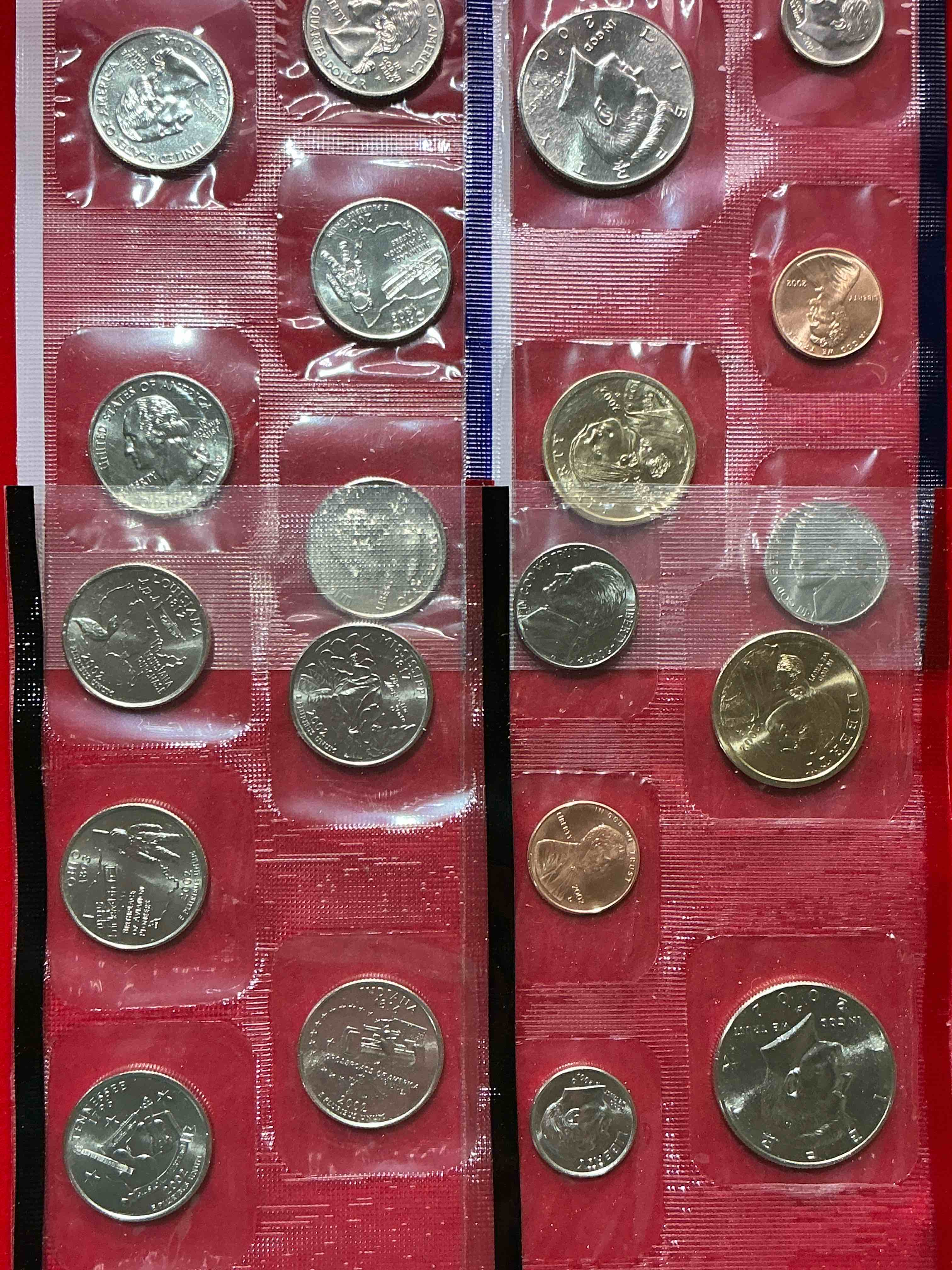 Condition photo showing New/Like New for 2002 uncirculated mint coins! 20 coins from philadelphia & denver! 20 coin uncirculated lot, with state quarters, nickels, half dollars, dimes, pennies & more! uncirculated coin craziness!
