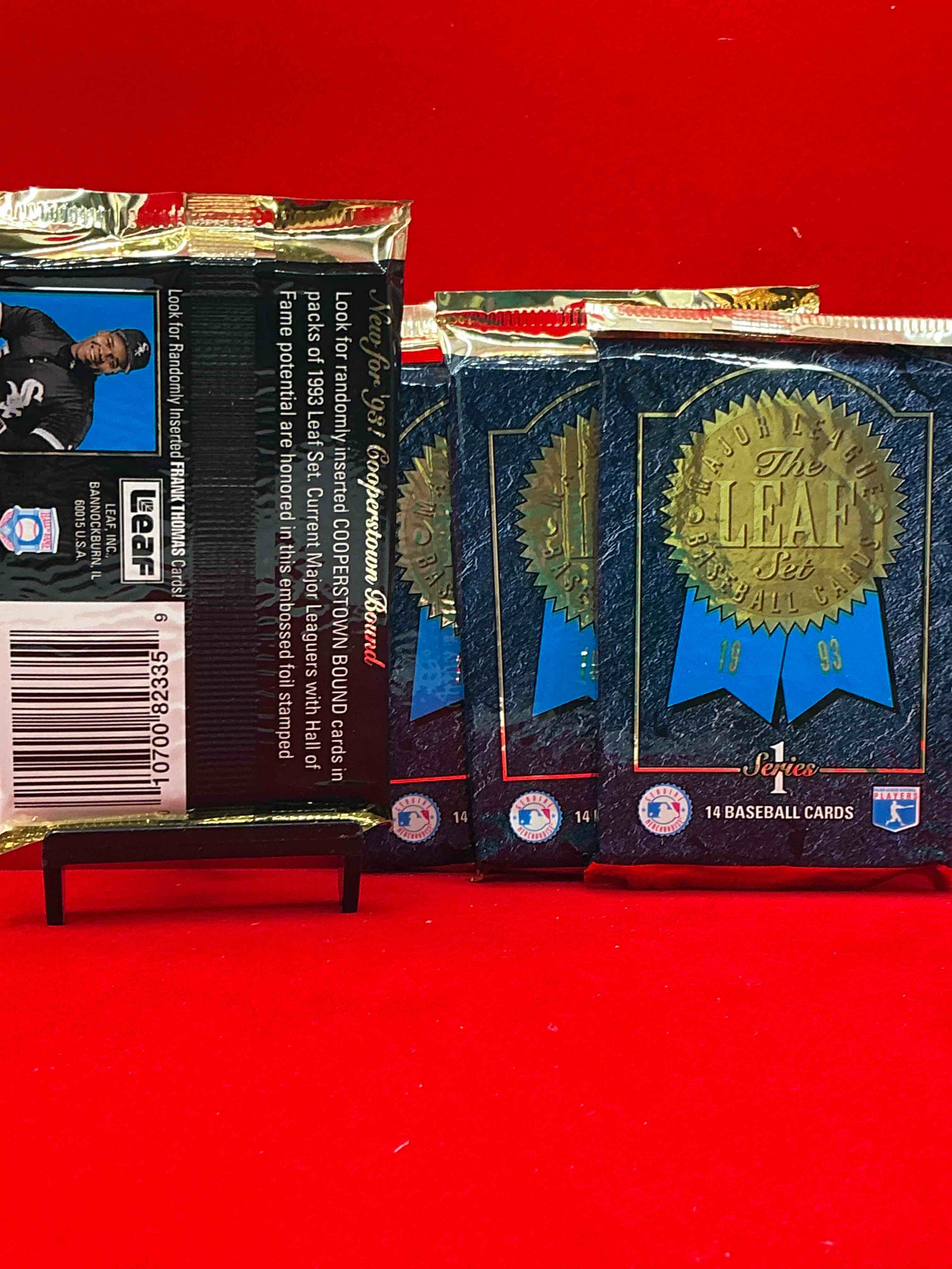 Condition photo showing New/Like New for 1993 leaf series 1 baseball sealed 14 card pack, direct from original retail display case, search for derek jeter, ken griffey jr. & so much morel search for highly collectible inserts. these cards are highly sought after by collectors for their holographic design, these are premium baseball cards from 1993!