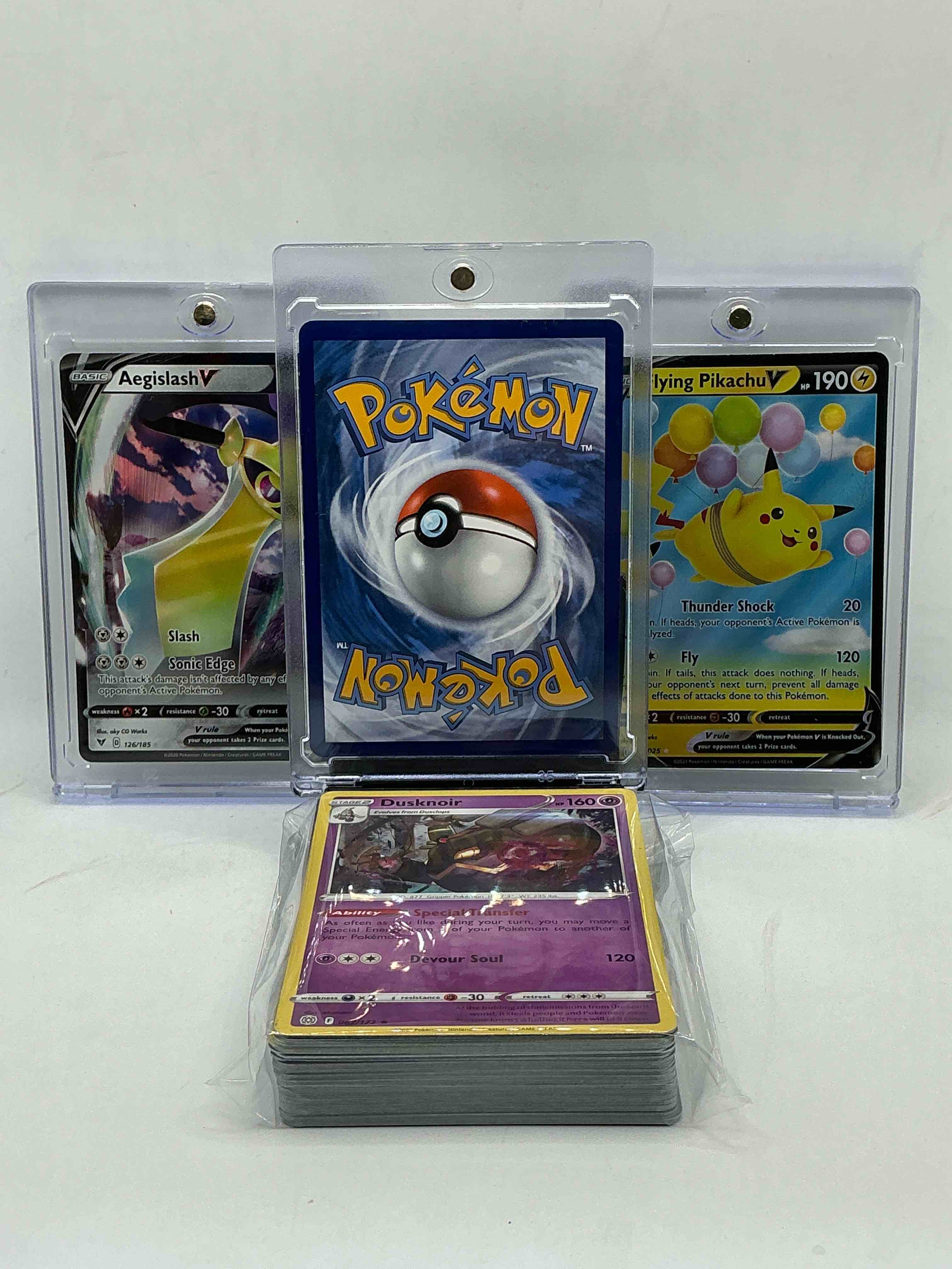 Condition photo showing New/Like New for coalossal v! aegislash v! flying pikachu v! along with 50 other pokémon heroes, holos, legends & commons- including holographic cards, stage 2 cards, holos in all forms & more! also includes 36 non holo common/ uncommon basic & first stage cards trainers & energy too! perfect set for collectors & enthusiasts!