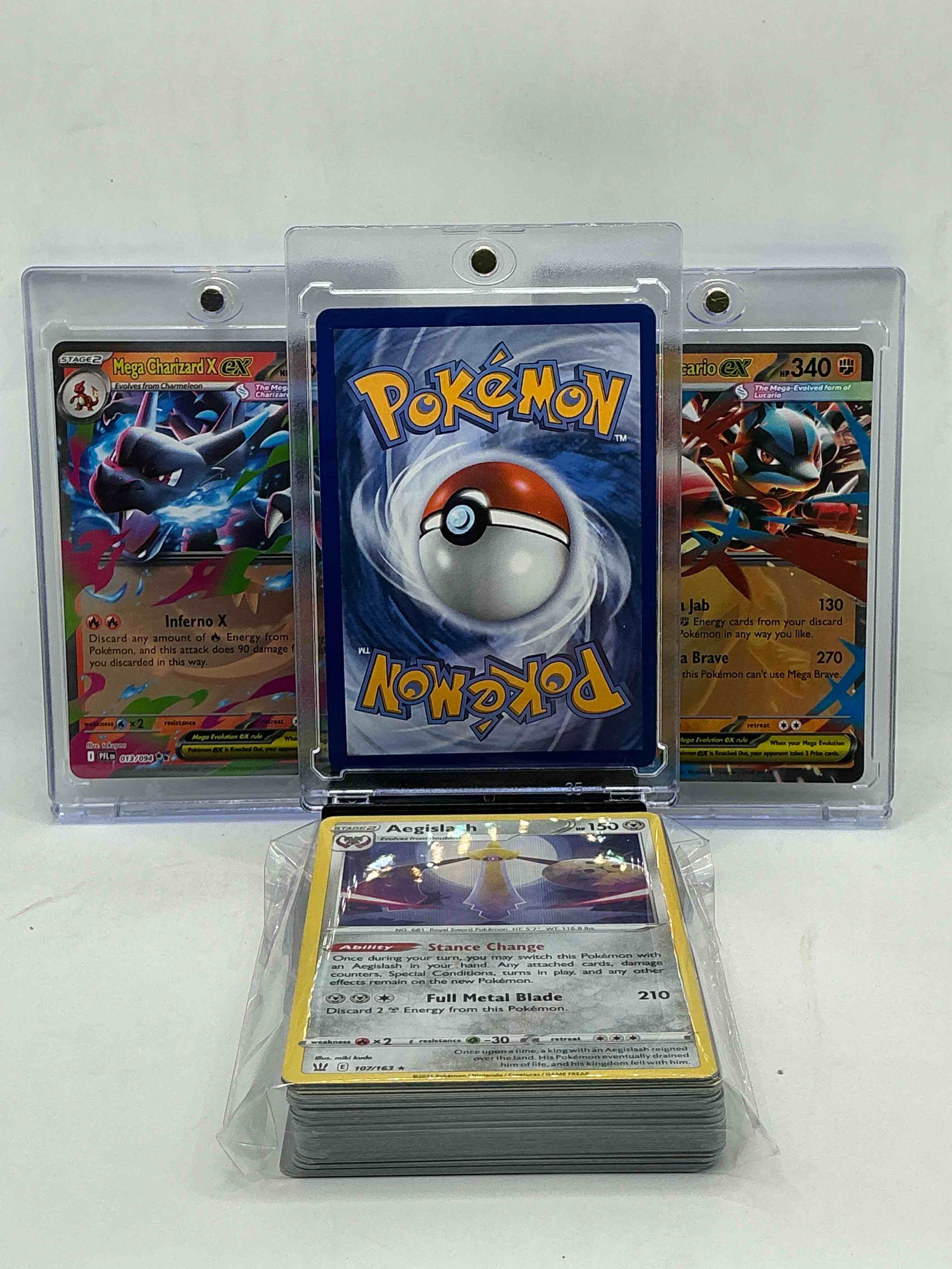 Condition photo showing New/Like New for mega charizard x ex! mega lucario ex! decidueye ex! along with 50 other pokémon heroes, holos, legends & commons- including holographic cards, stage 2 cards, holos in all forms & more! also includes 36 non holo common/ uncommon basic & first stage cards trainers & energy too! perfect set for collectors & enthusiasts!