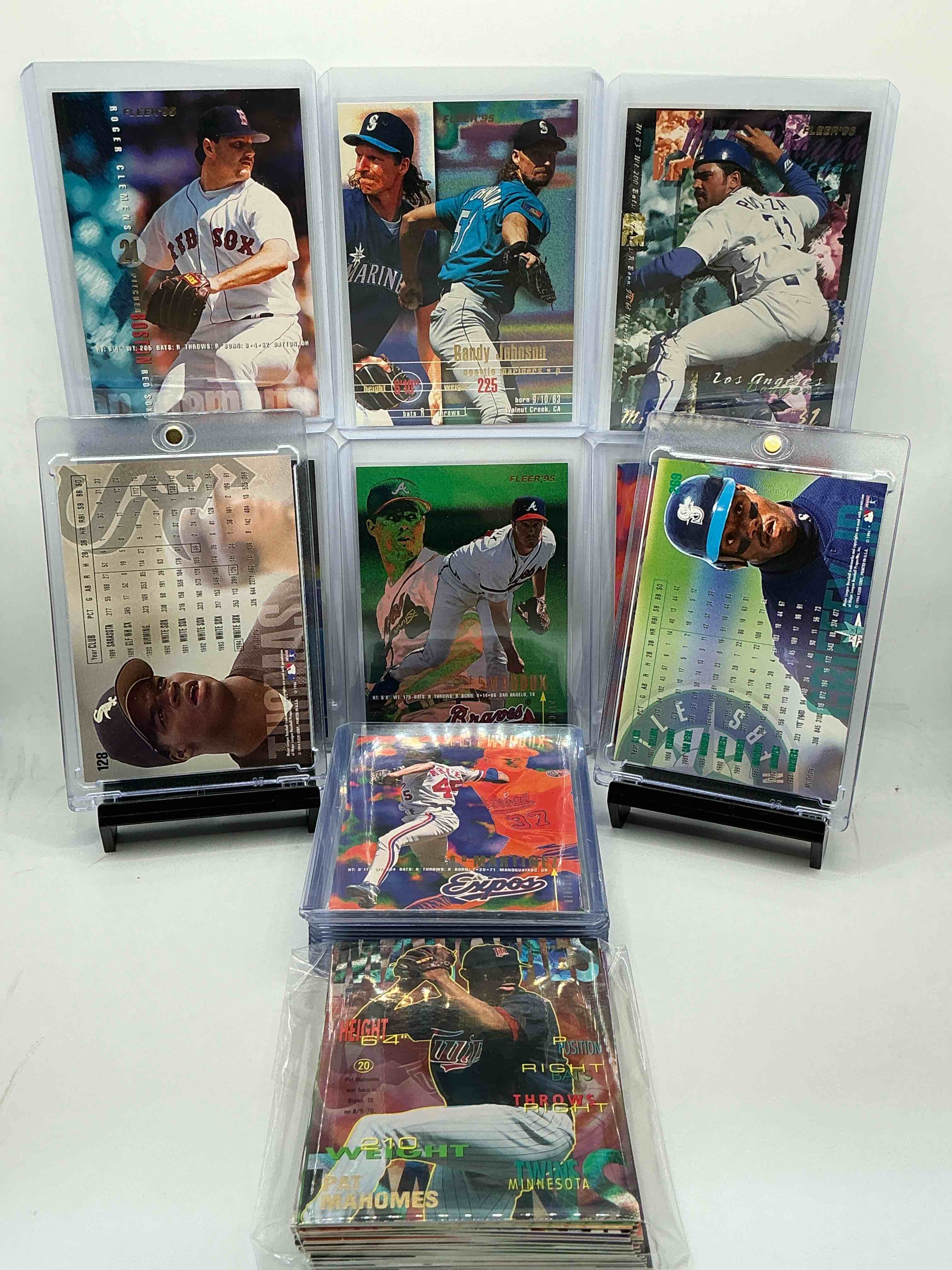 Condition photo showing New/Like New for 1994 fleer mlb 50 card craziness! ken griffey jr & frank thomas! so many other legends included like randy johnson, the big 3 braves pitchers (glavine, smoltz & maddux), roger clemons, barry bonds & so many more! wow!