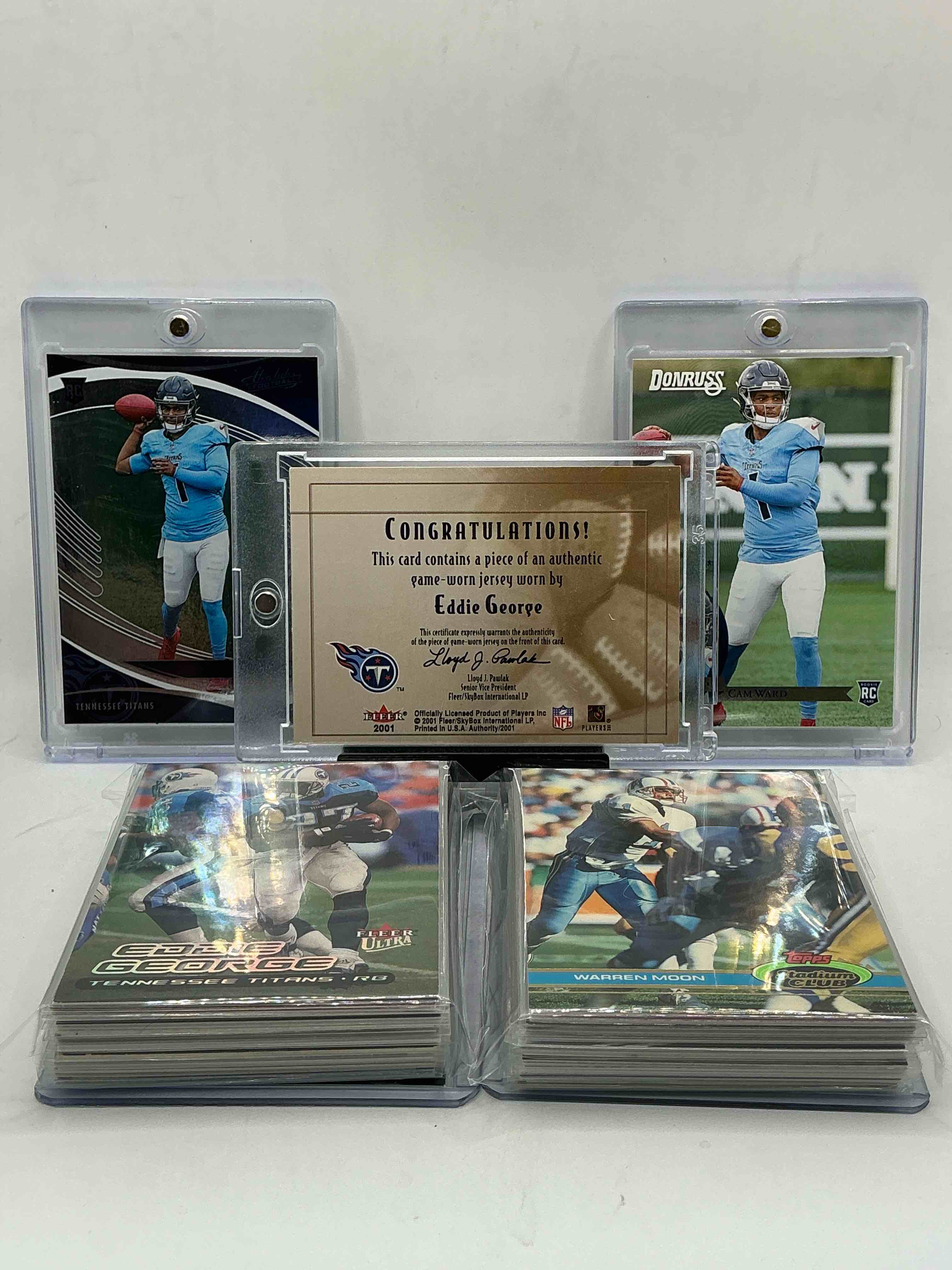 Condition photo showing New/Like New for tennessee titans craziness! eddie george game worn patch! donruss & absolute cam ward rookies! wow! along with 50 other tennessee titans heroes, rookies, legends & commons!