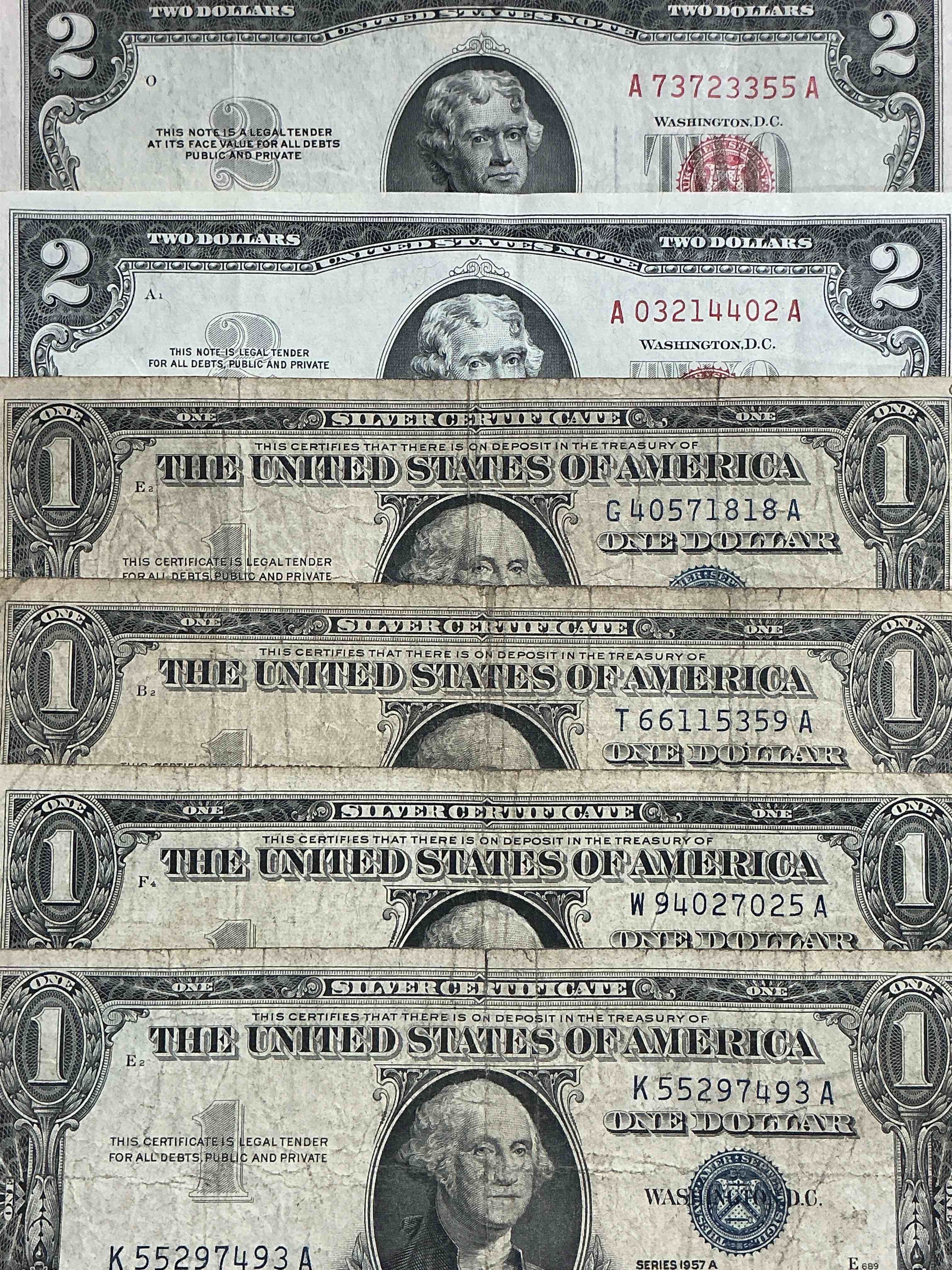 rare american dollar bills! red seal two dollar bill, along with silver certificates! red seal two dollar bill in good condition & silver certificates produced from 1878 to 1964 & are still considered legal tender at face value. here are gorgeous, circulated 1935 & 1957 series u.s. one dollar silver certificate, with highly collectible "blue seal!* own an awesome piece of history! american dollar lot!