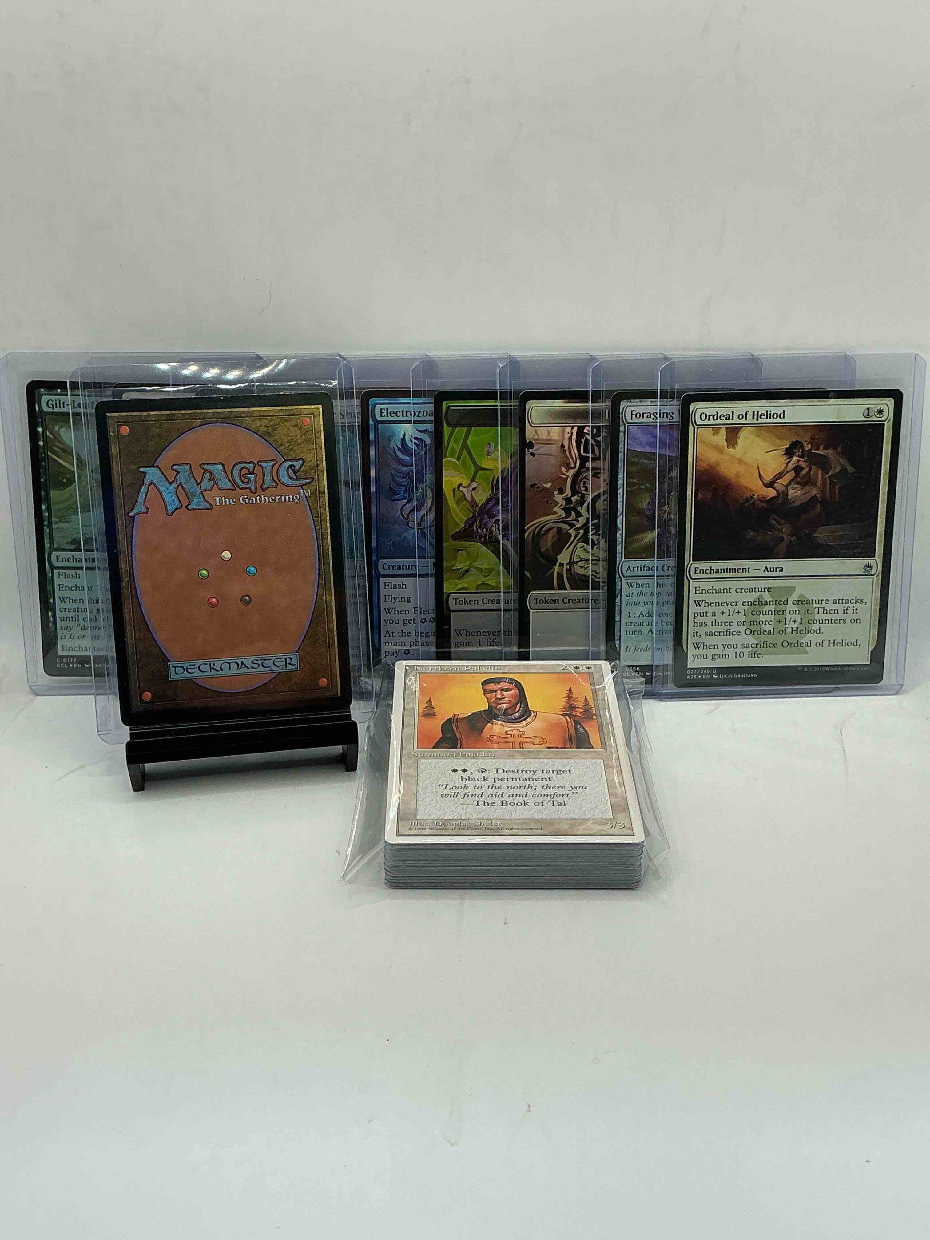Condition photo showing New/Like New for magic the gathering 50 card lot! lot includes 10 rare or holo foil cards! all cards in excellent shape condition! a great way to join the mtg craze!