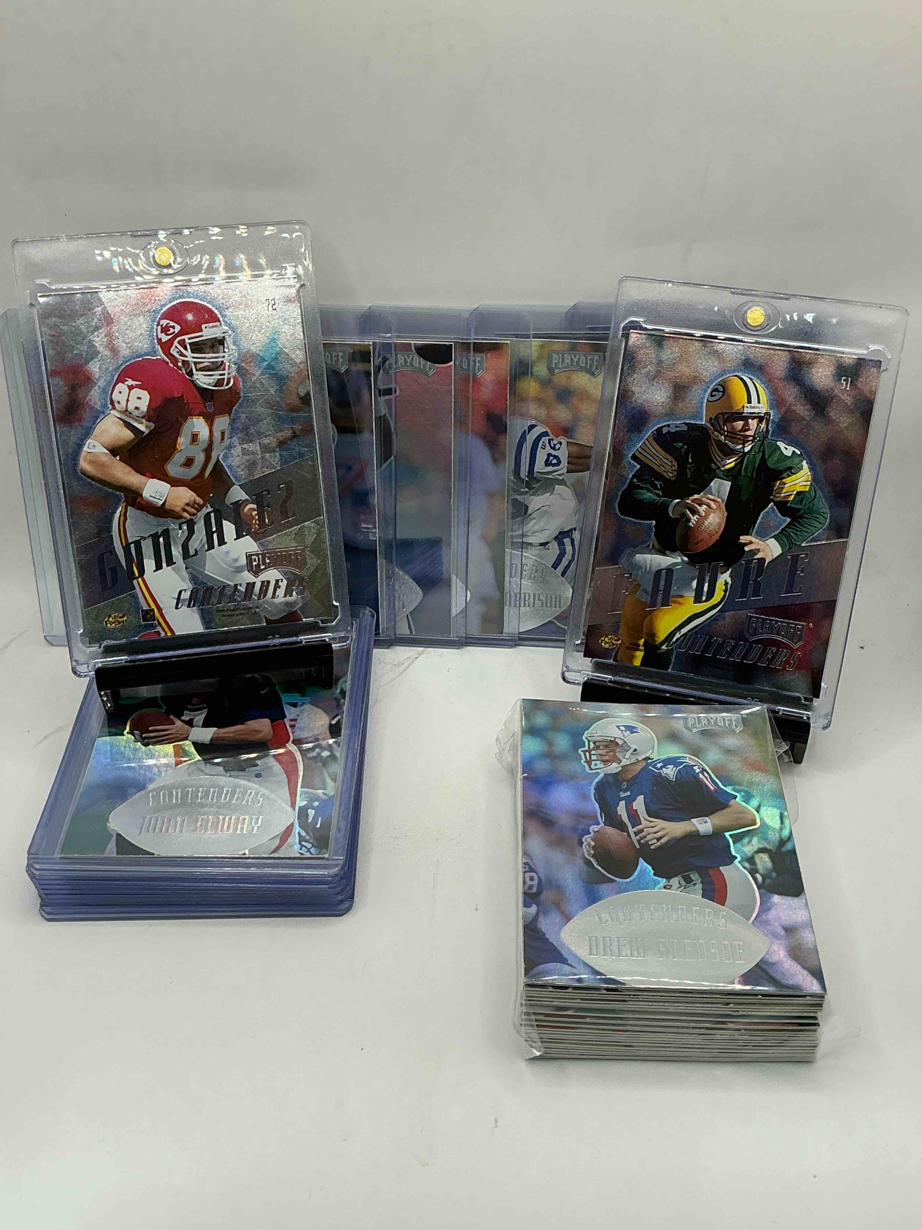 Condition photo showing New/Like New for 1997 playoff contenders 50 card craziness! some crazy names included here! brett favre & tony gonzalez! jerry rice! terrell owens! eddie george! marshall faulk! marvin harrison! troy aikman & more! grab this 50 card lot while you can!