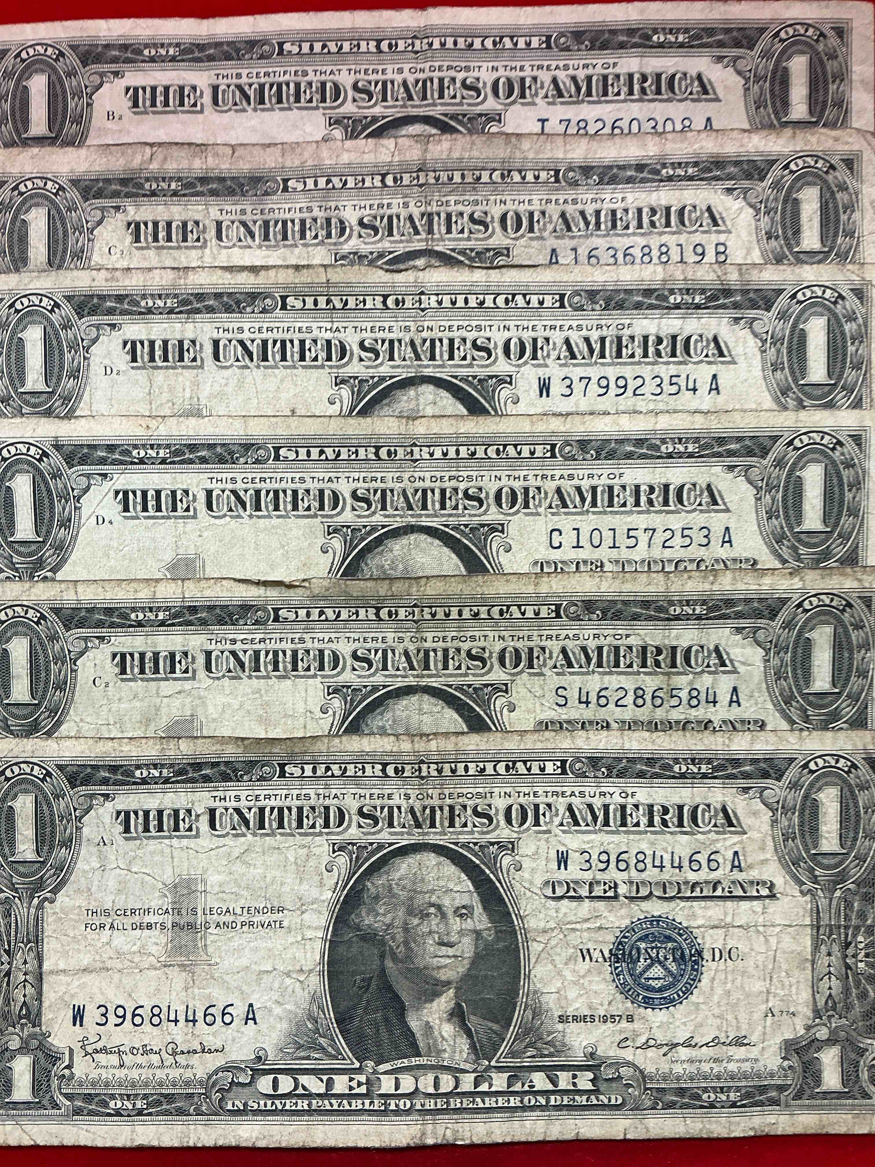 Condition photo showing Good Condition for 1957 silver certificates! did you know that prior to 1964 one dollar u.s. paper money was actually redeemable for silver dollars?! wow how times have changed! silver certificates were produced from 1878 to 1964 & are still considered legal tender at face value. here are gorgeous, circulated 1957 u.s. one dollar silver certificate, with highly collectible "blue seal!* own an awesome piece of history!