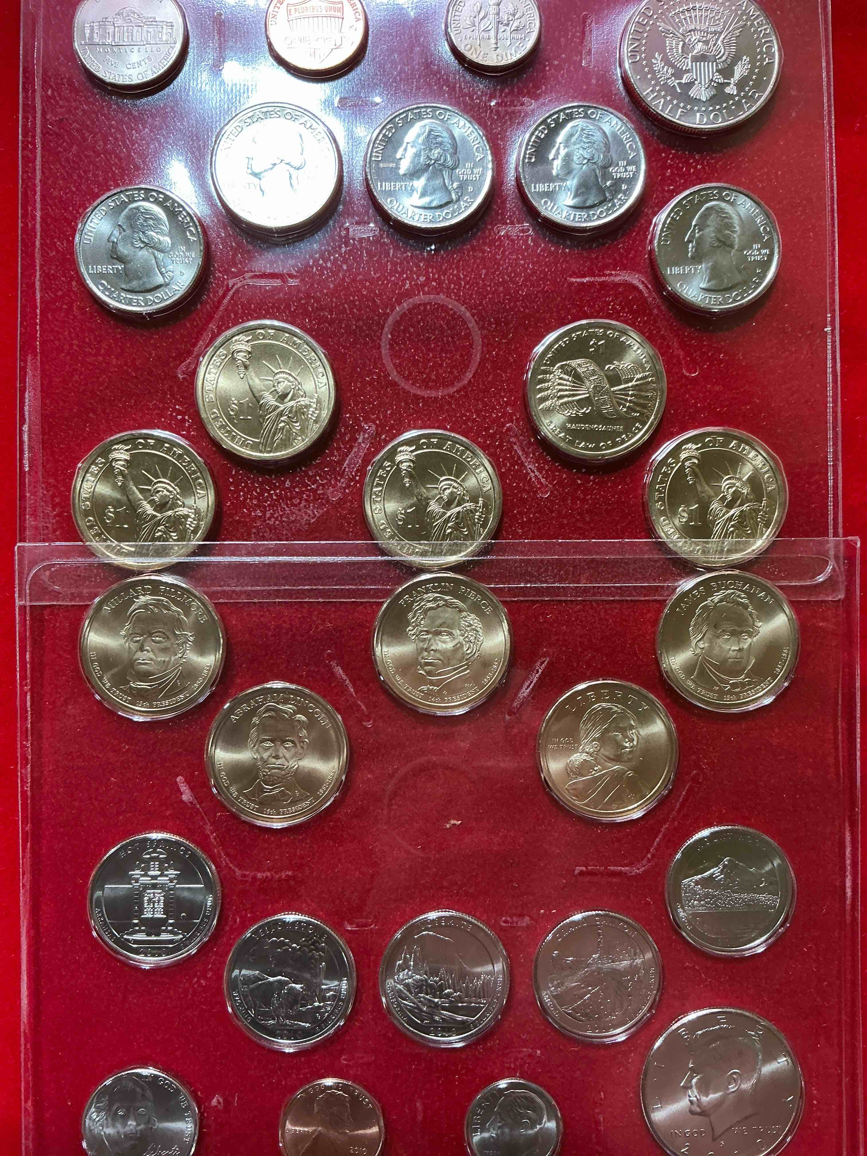 Condition photo showing New/Like New for 2010 uncirculated mint coins! 28 coin lot, with multiple dollar coins, half dollars, quarters, dimes, nickels & pennies! wow!