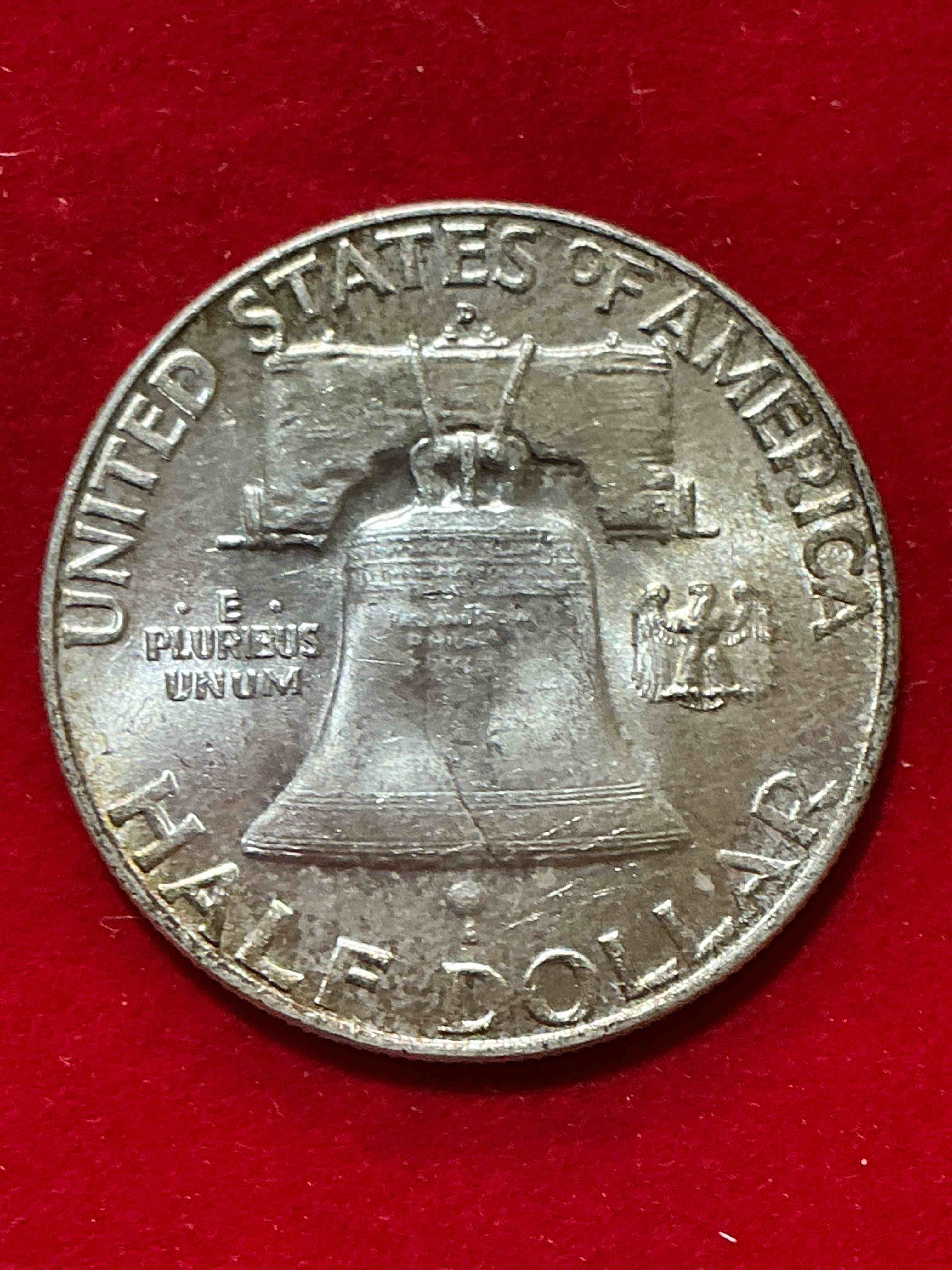 Condition photo showing New/Like New for ben franklin silver! pre 1965 silver u.s. half dollar coin! before 1965 american half dollars were actually silver, here is a rare 1957 version in good condition! great for investing in precious metals! these heavy half dollars were minted at 90% silver and 10% copper, giving them a net weight of .36169 ounces of pure silver per coin! very rare in this great condition!