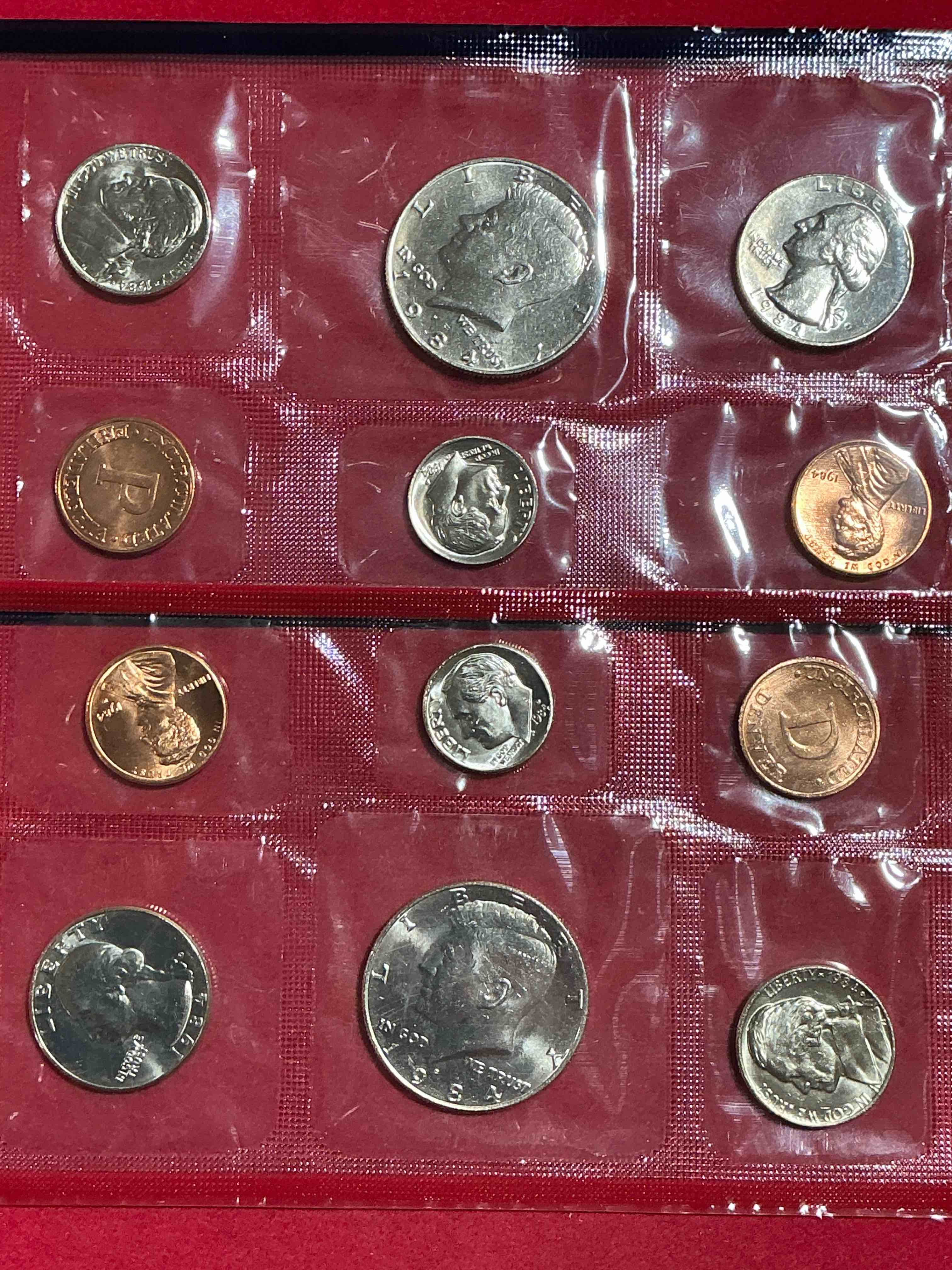 1984 uncirculated philadelphia & denver 12 coin mint combo! these beautiful, uncirculated coins are rare pieces of history! 1984 dimes, pennies half dollars, nickels & quarters!