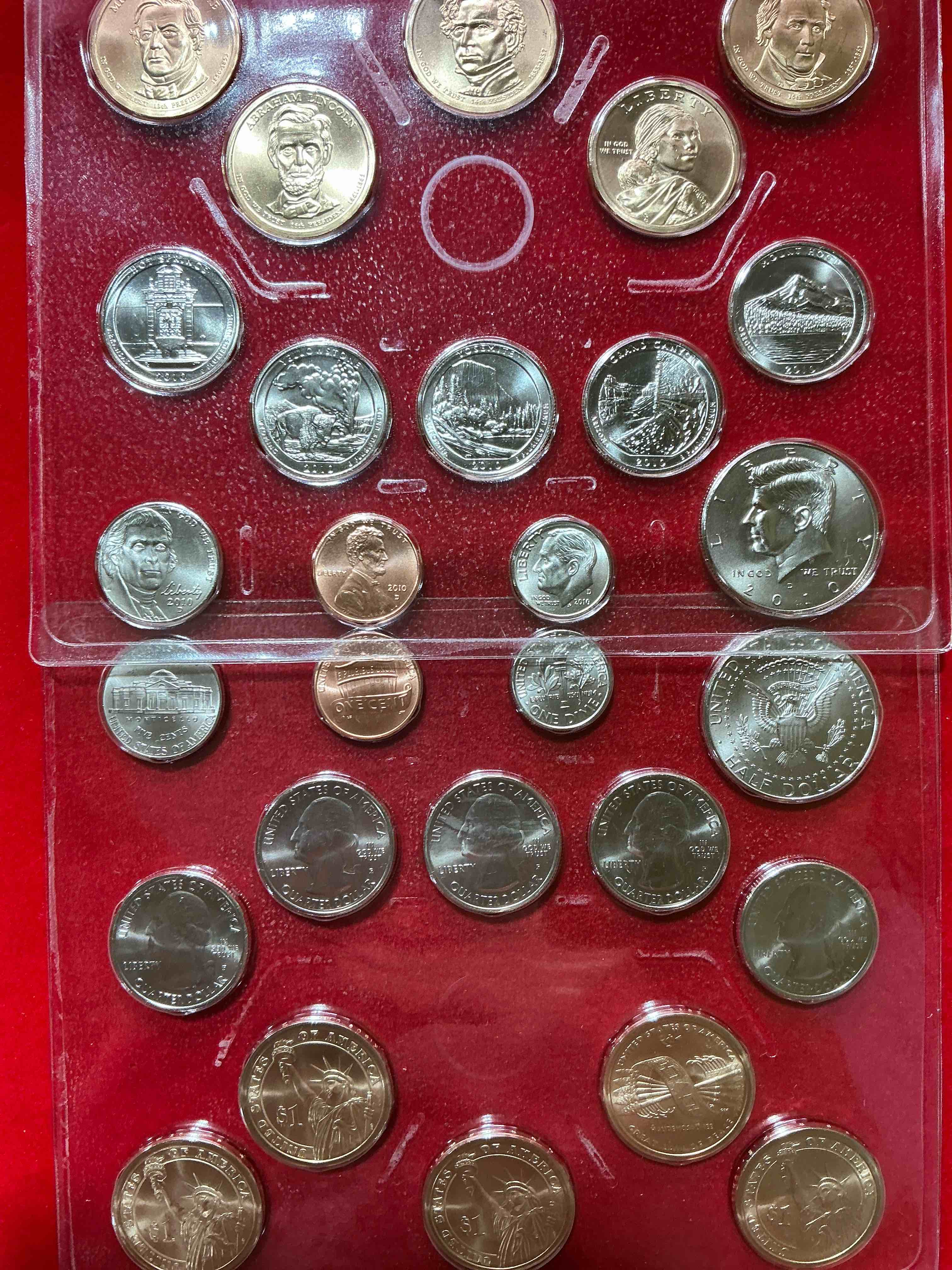 2010 uncirculated mint coins! 28 coin lot, with multiple dollar coins, half dollars, quarters, dimes, nickels & pennies! wow!