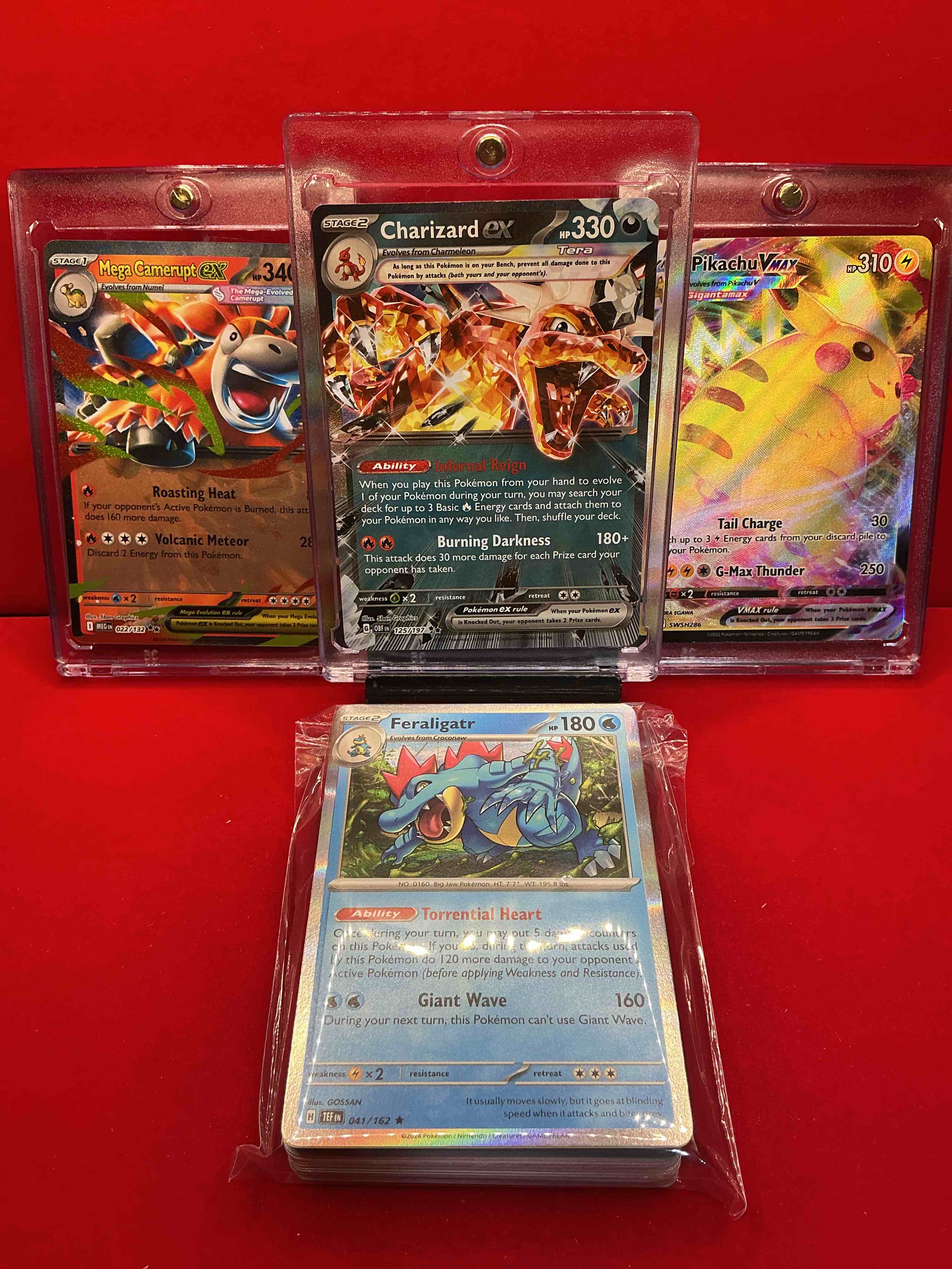 Pokémon Party! Charizard EX! Pikachu VMax, Mega Camerupt! Along With 50 Other Pokémon Heroes, Holos, Legends & Commons- Including Holographic Cards, Stage 2 Cards, Holos In All Forms & More! Also Includes 36 Non Holo Common/ Uncommon Basic & First Stage Cards Trainers & Energy Too! Perfect Set For Collectors & Enthusiasts!
