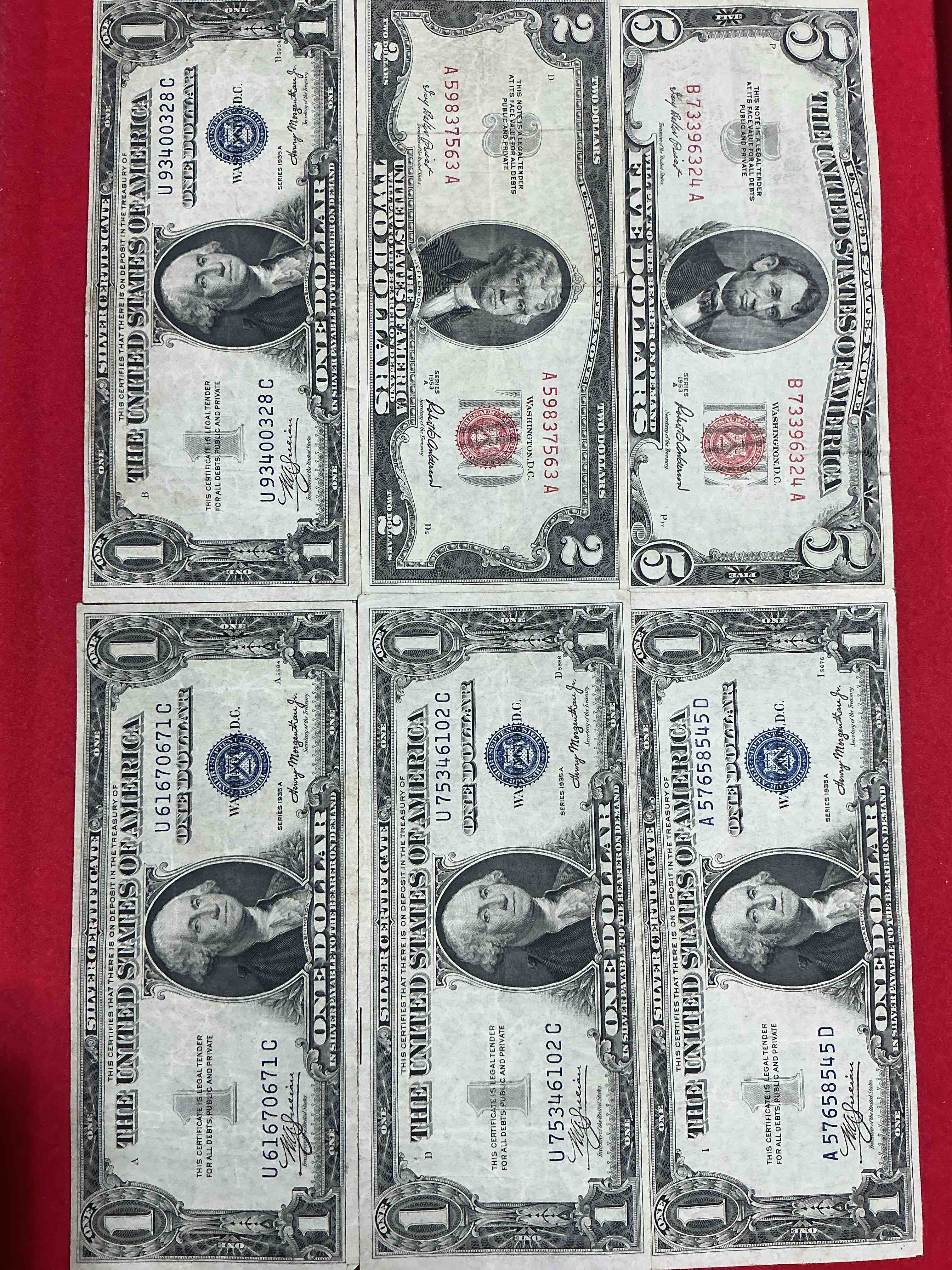 Rare American Dollar Bills! RED Seal Five Dollar Bill & Red Seal Two Dollar Bill, Along With Silver Certificates! Five Dollar Bill Ultra Rare & In Good Condition, Red Seal Two Dollar Bill In Good Condition & Silver Certificates Produced From 1878 To 1964 & Are Still Considered Legal Tender At Face Value. Here Are Gorgeous, Circulated 1935 & 1957 U.S. One Dollar Silver Certificate, With Highly Collectible "Blue Seal!* Own An Awesome Piece Of History! American Dollar Lot! 