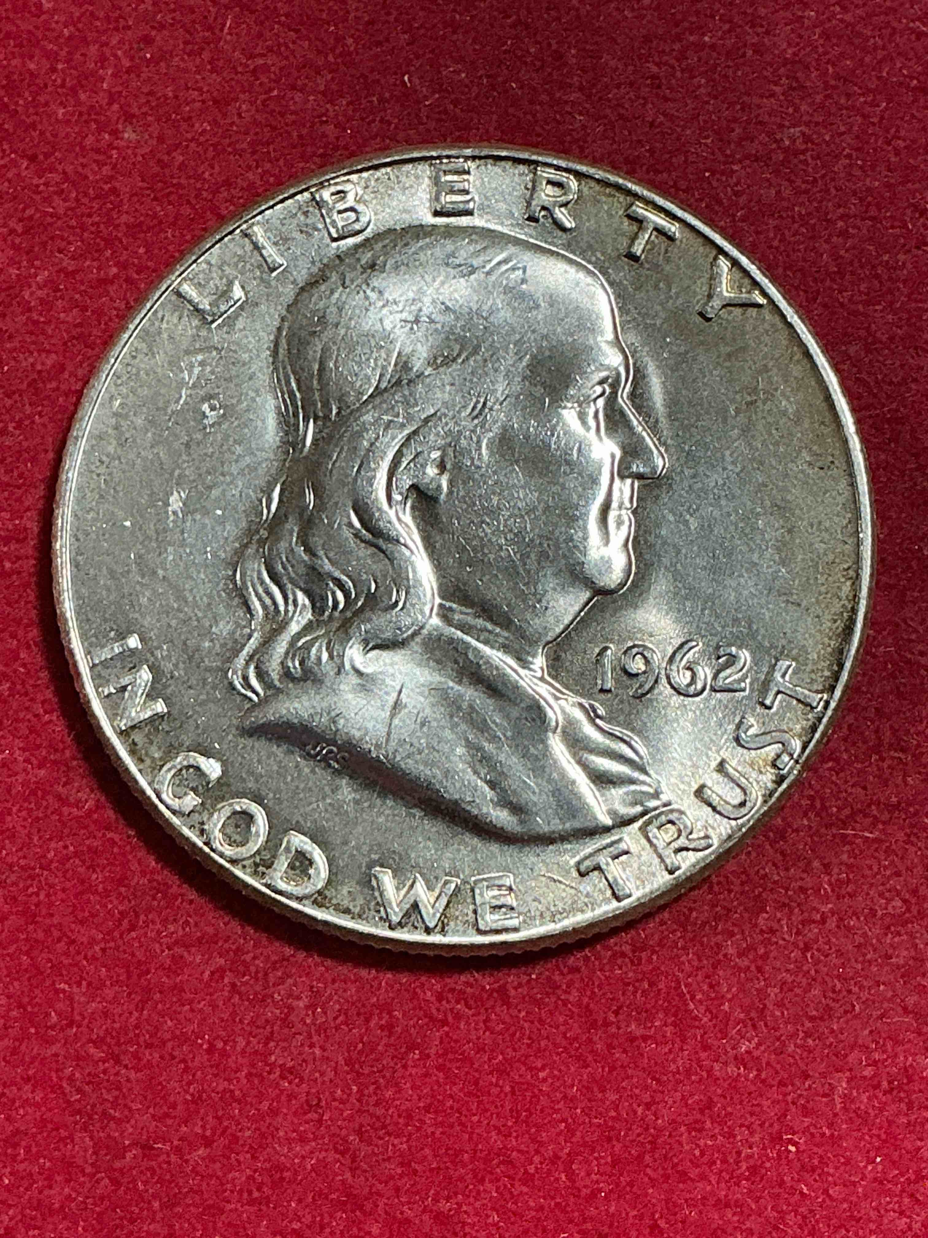 ben franklin silver! pre 1965 silver u.s. half dollar coin! before 1965 american half dollars were actually silver, here is a rare 1962 version in good condition! great for investing in precious metals! these heavy half dollars were minted at 90% silver and 10% copper, giving them a net weight of .36169 ounces of pure silver per coin! very rare in this great condition!
