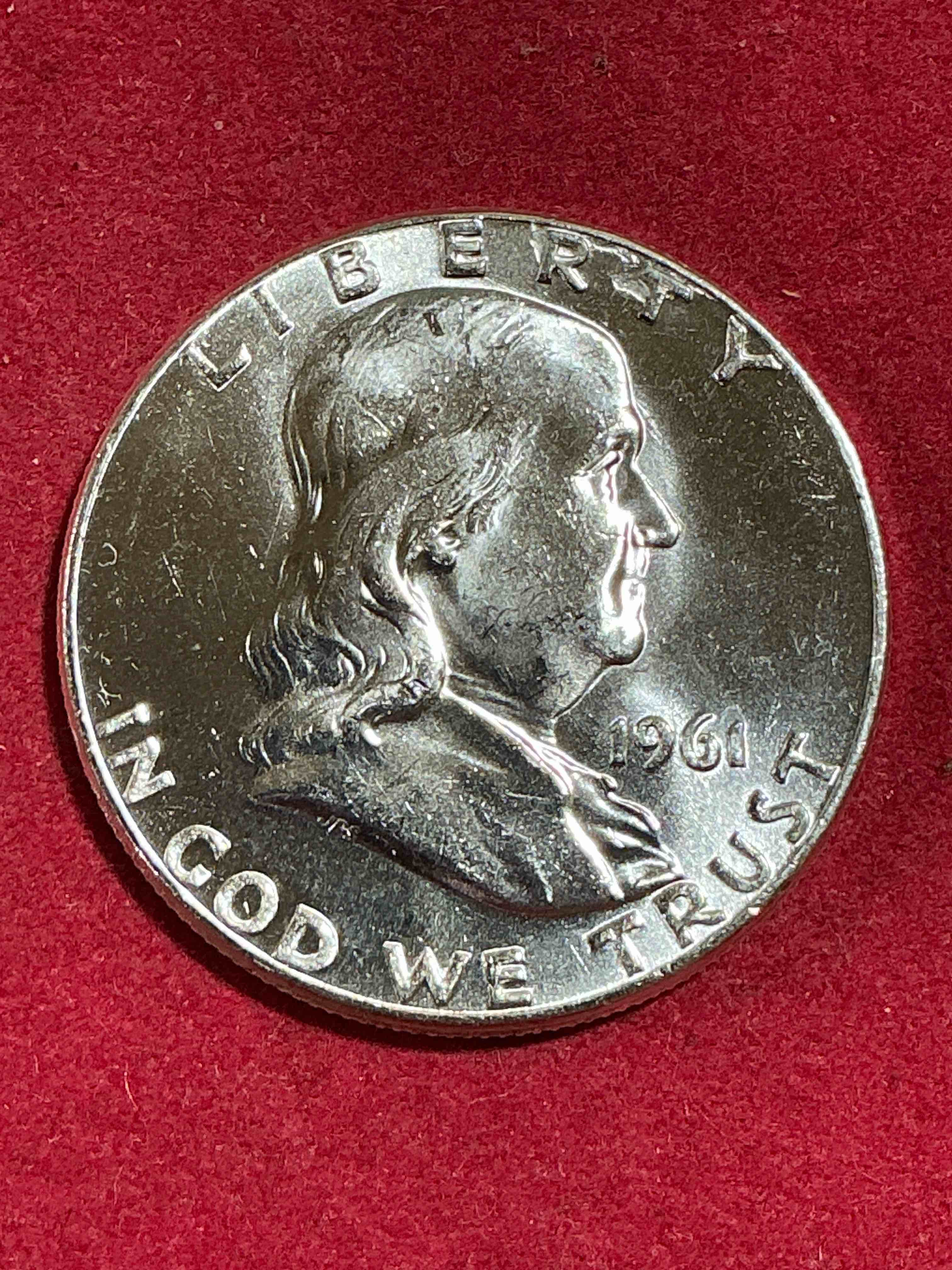 uncirculated ben franklin silver! pre 1965 silver u.s. half dollar coin! before 1965 american half dollars were actually silver, here is a rare 1961 version in uncirculated condition! great for investing in precious metals! these heavy half dollars were minted at 90% silver and 10% copper, giving them a net weight of .36169 ounces of pure silver per coin! very rare in this great condition!