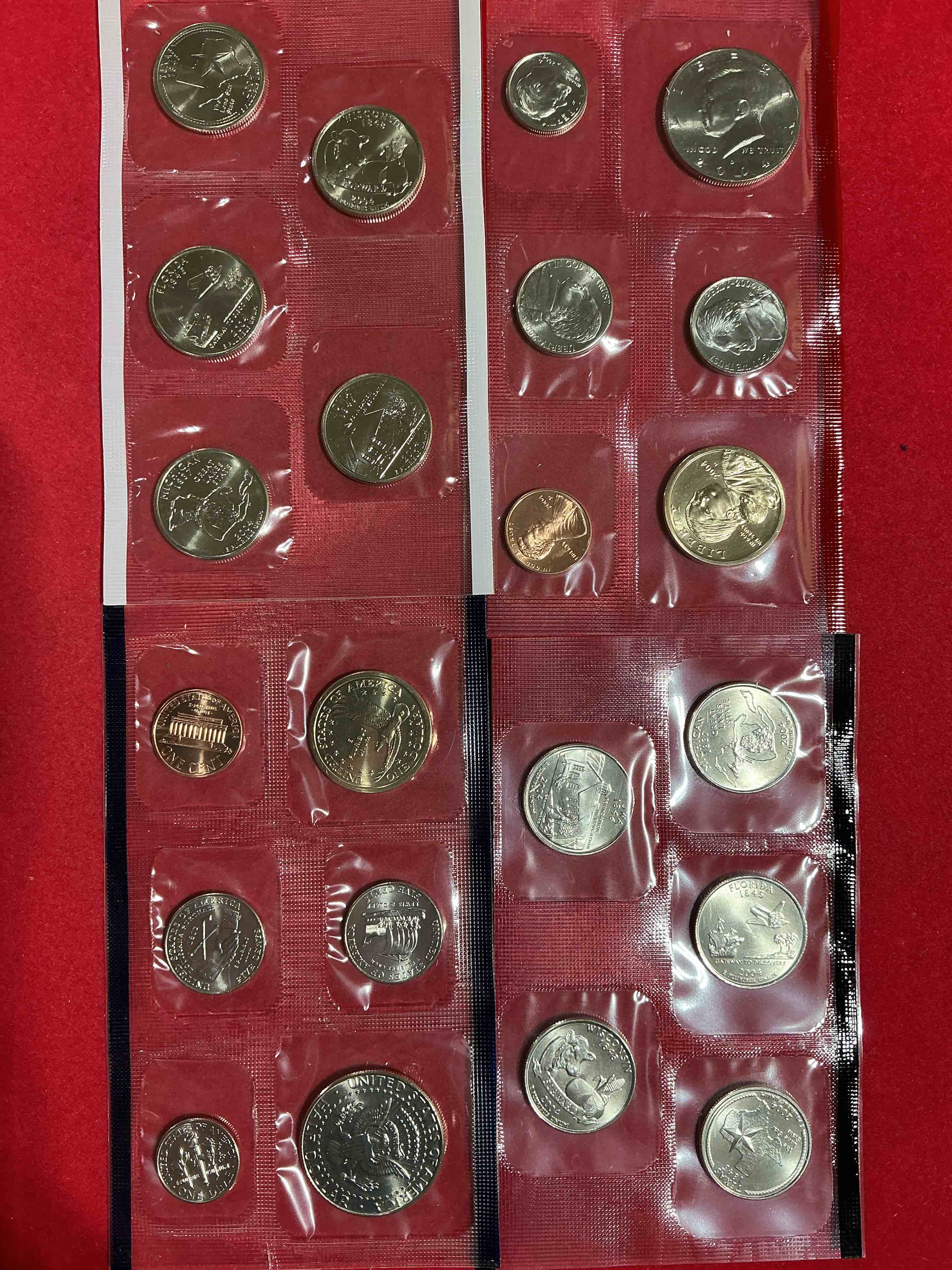 no way! full denver & philadelphia 2004 mint sets, 22 total coins! these mint sets are highly coveted for their coins inside… 22 coins, two sacagawea dollars, two half dollars, quarters, nickels, dimes & pennies!