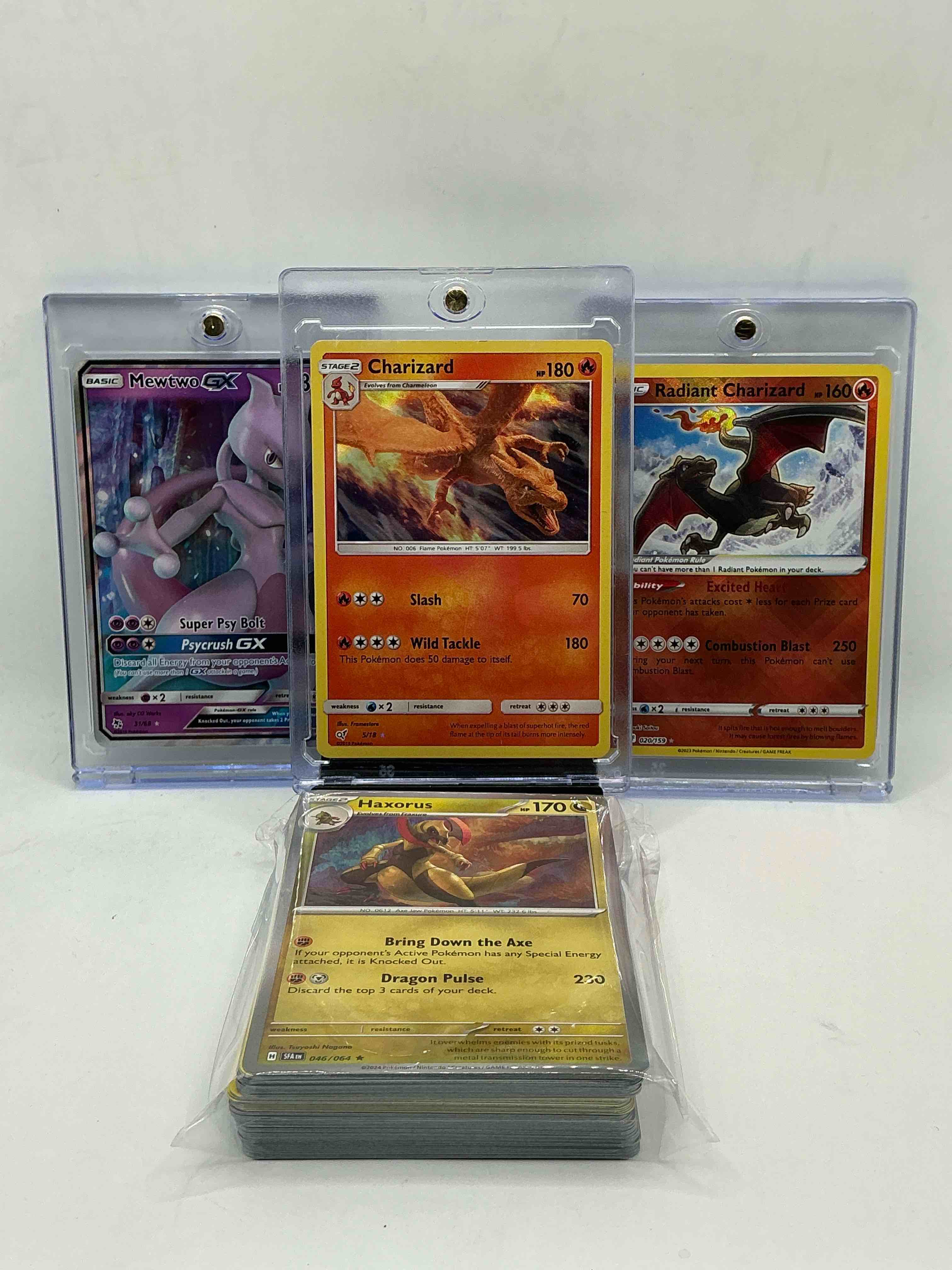 pokémon palooza! charizard! radiant charizard! mewtwo ex! along with 50 other pokémon heroes, holos, legends & commons- including holographic cards, stage 2 cards, holos in all forms & more! also includes 36 non holo common/ uncommon basic & first stage cards trainers & energy too! perfect set for collectors & enthusiasts!