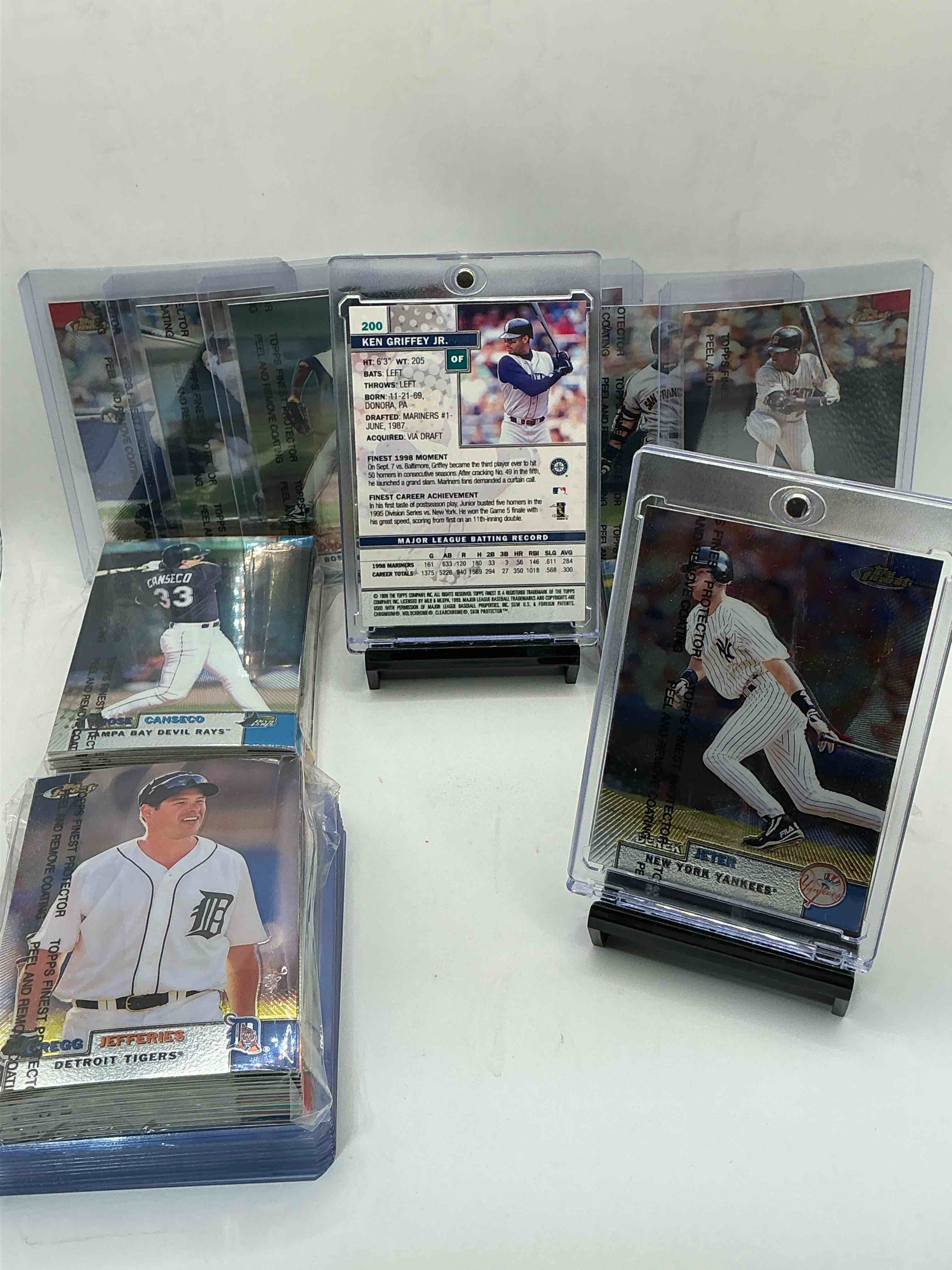 Condition photo showing New/Like New for 1999 topps finest 100 card mlb craziness! all the best players from the 90’s including ken griffey jr, arod, derek jeter, mike piazza, barry bonds, frank thomas, chipper jones, david ortiz & so many more! one of the nicest topps sets all with the peel protectors still intact! get this amazing set before it’s gone! wow!